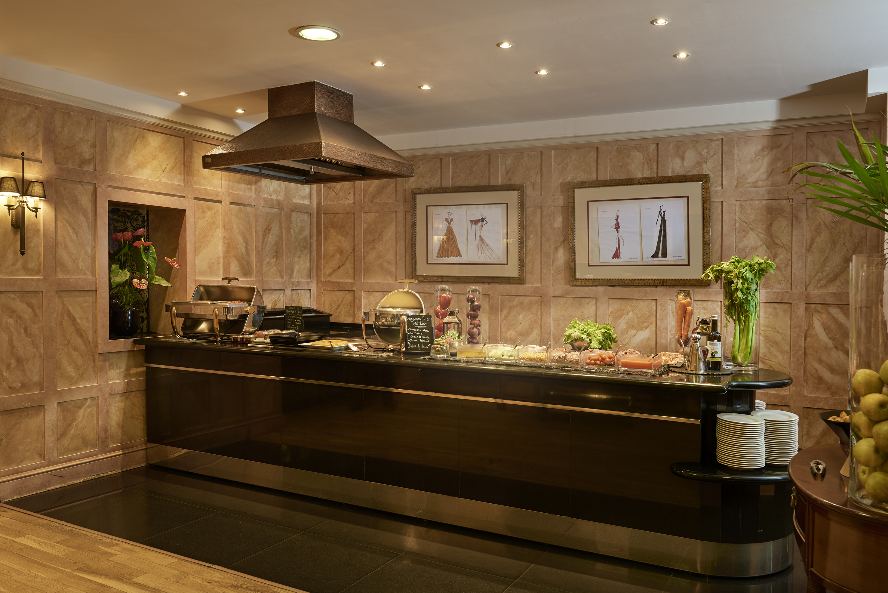 Elegant hotel breakfast buffet with fresh produce, hot dishes, and stylish decor.