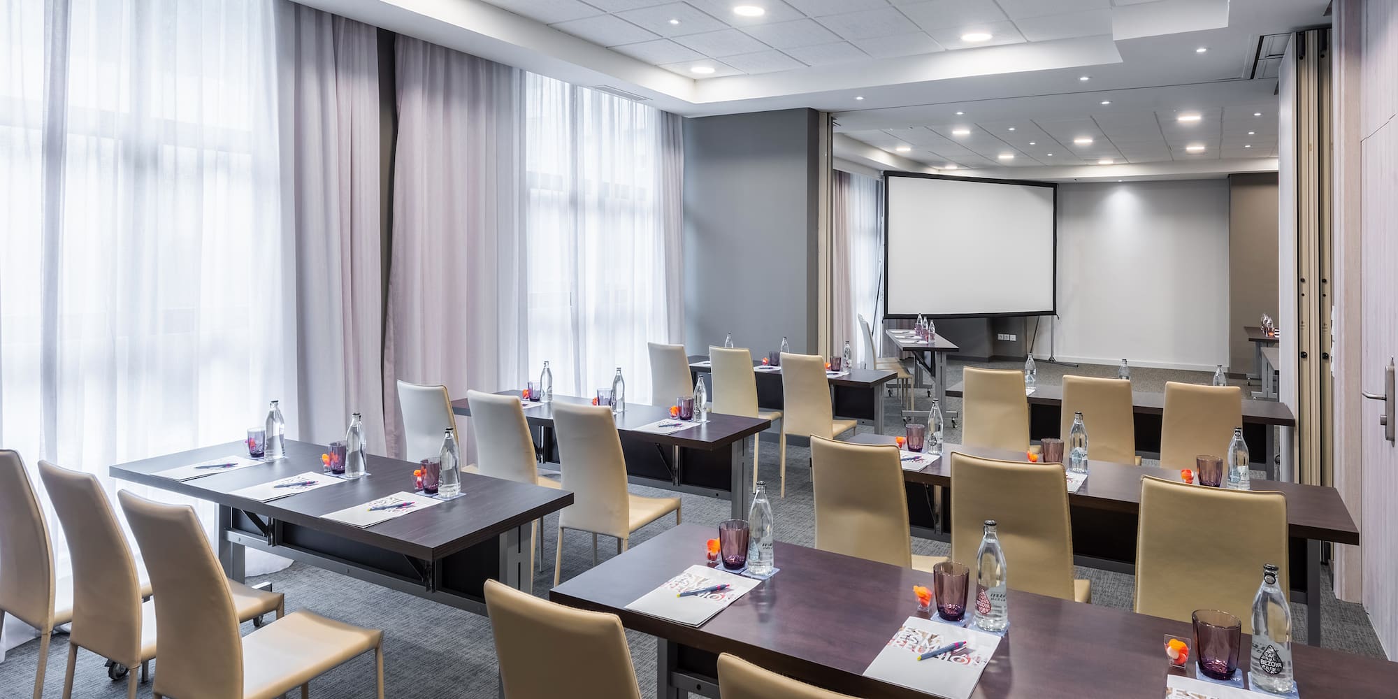 a room with tables and chairs