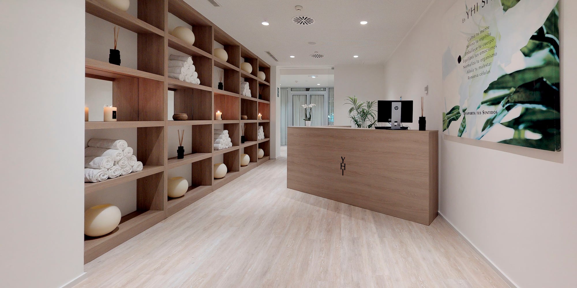 a room with shelves and a desk