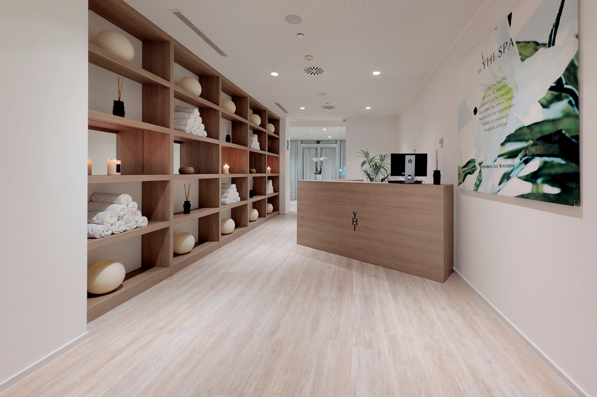 a room with shelves and a desk