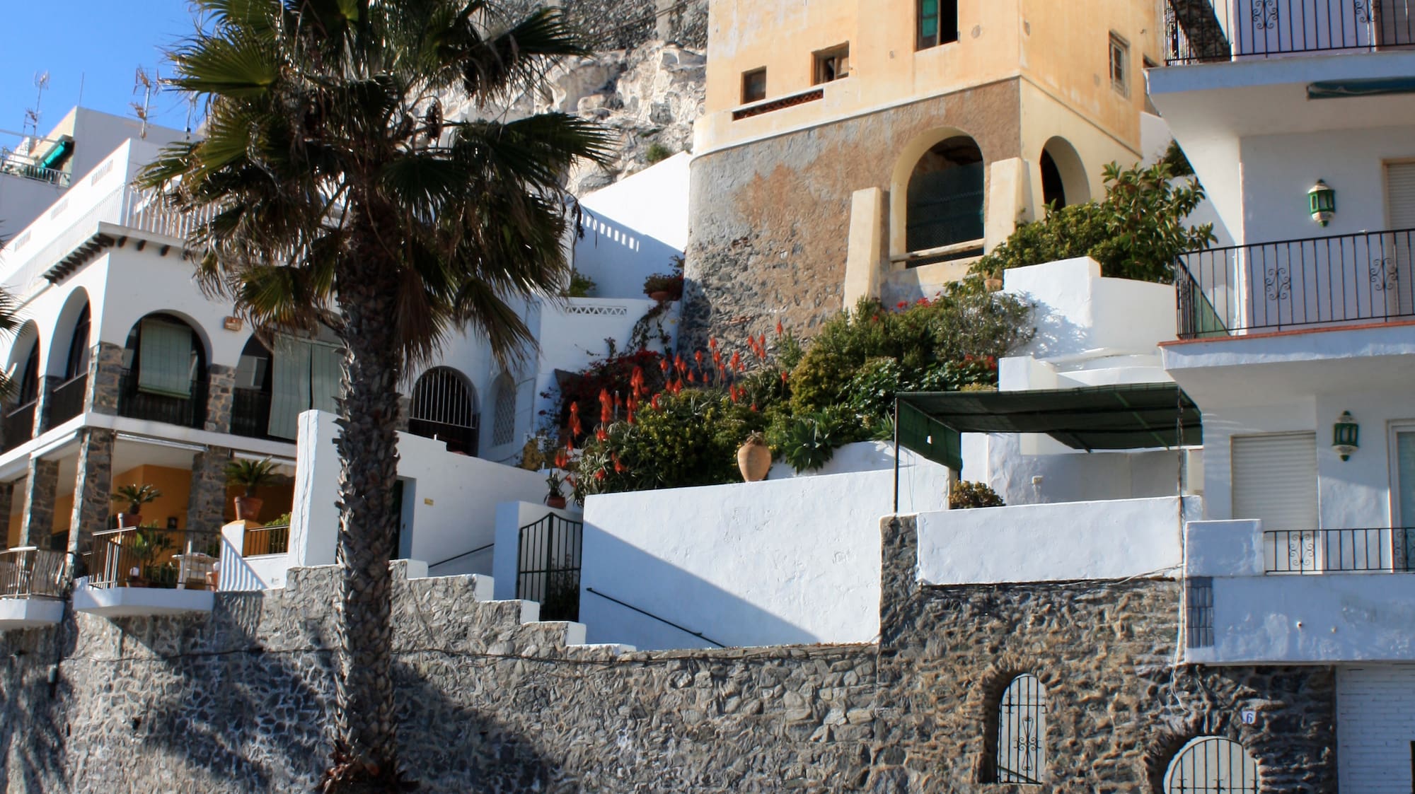 a group of buildings on a hill