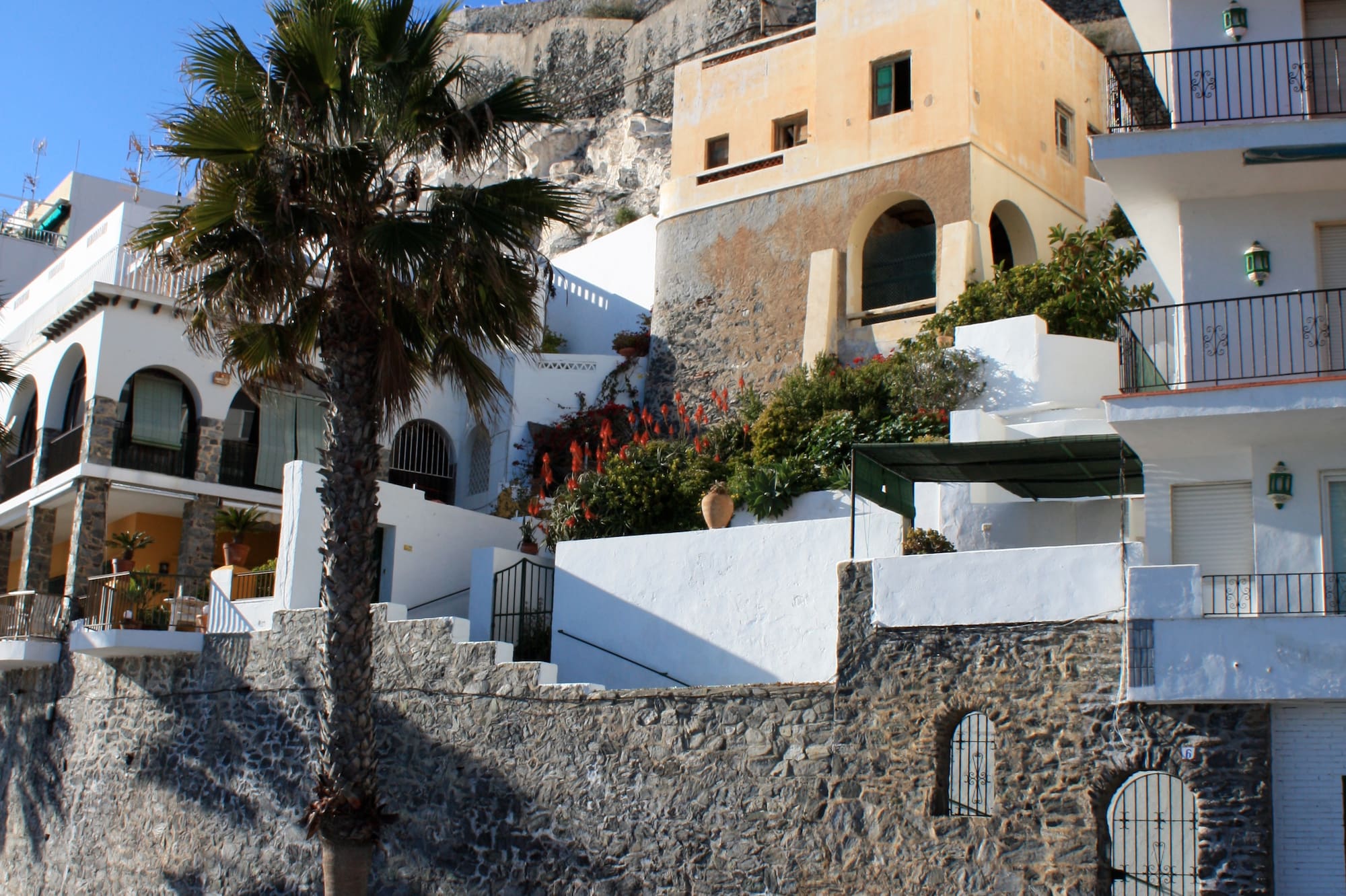a group of buildings on a hill