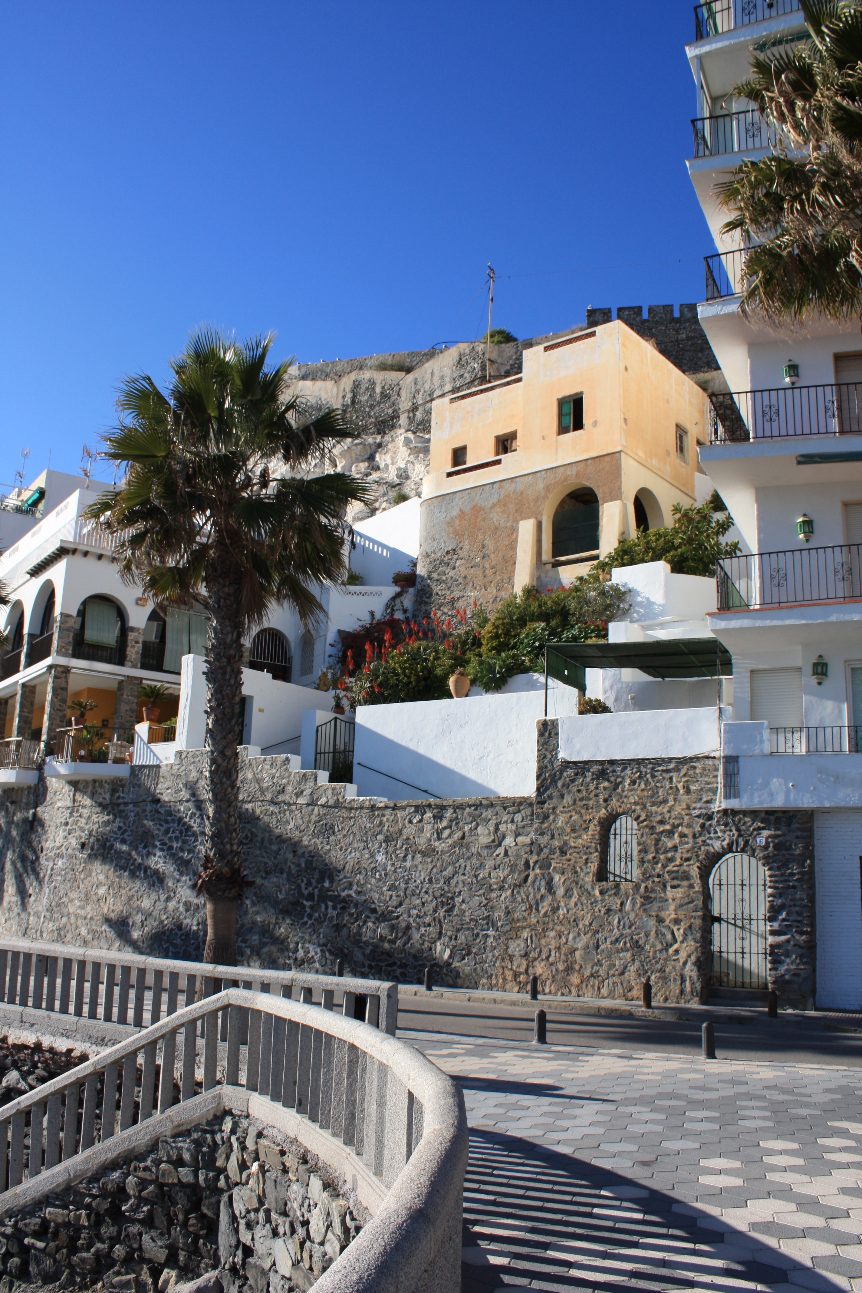 a group of buildings on a hill