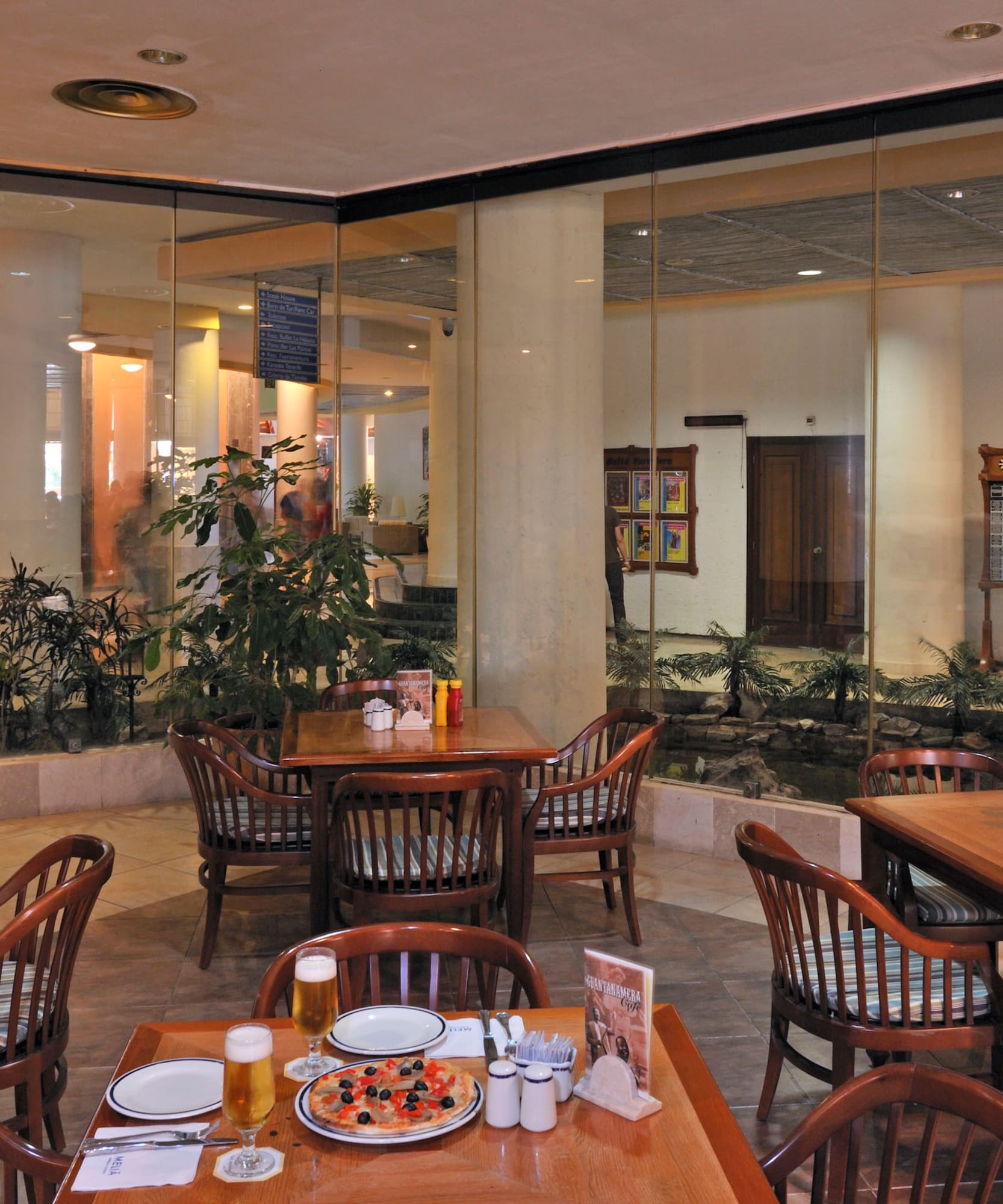 a restaurant with tables and chairs