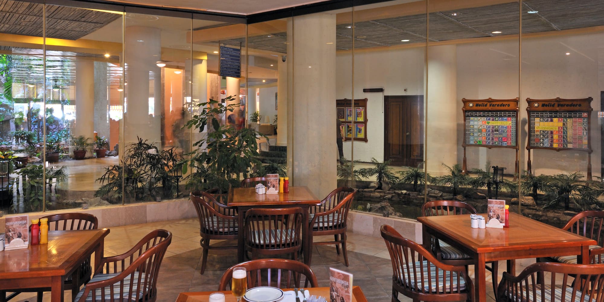 a restaurant with tables and chairs