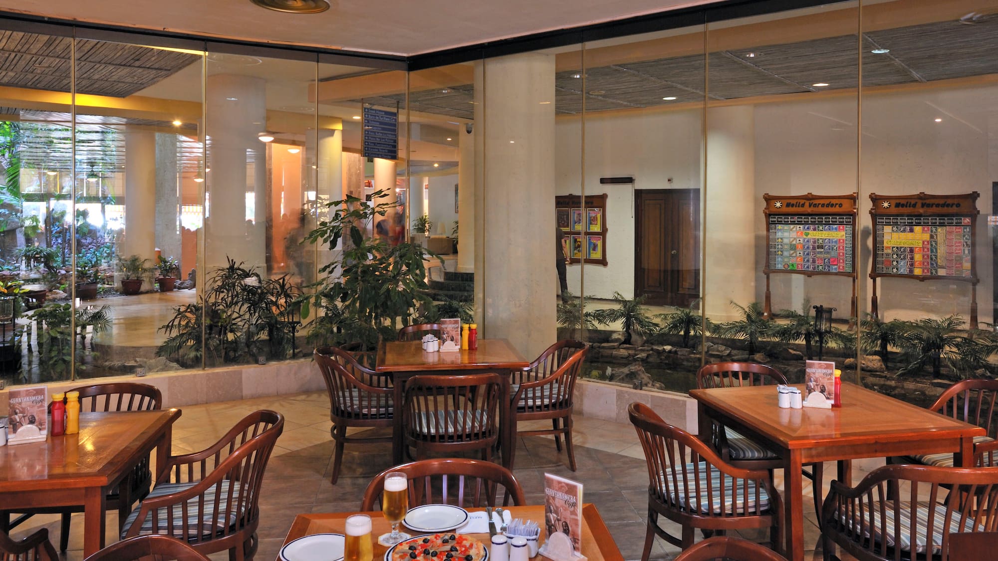 a restaurant with tables and chairs