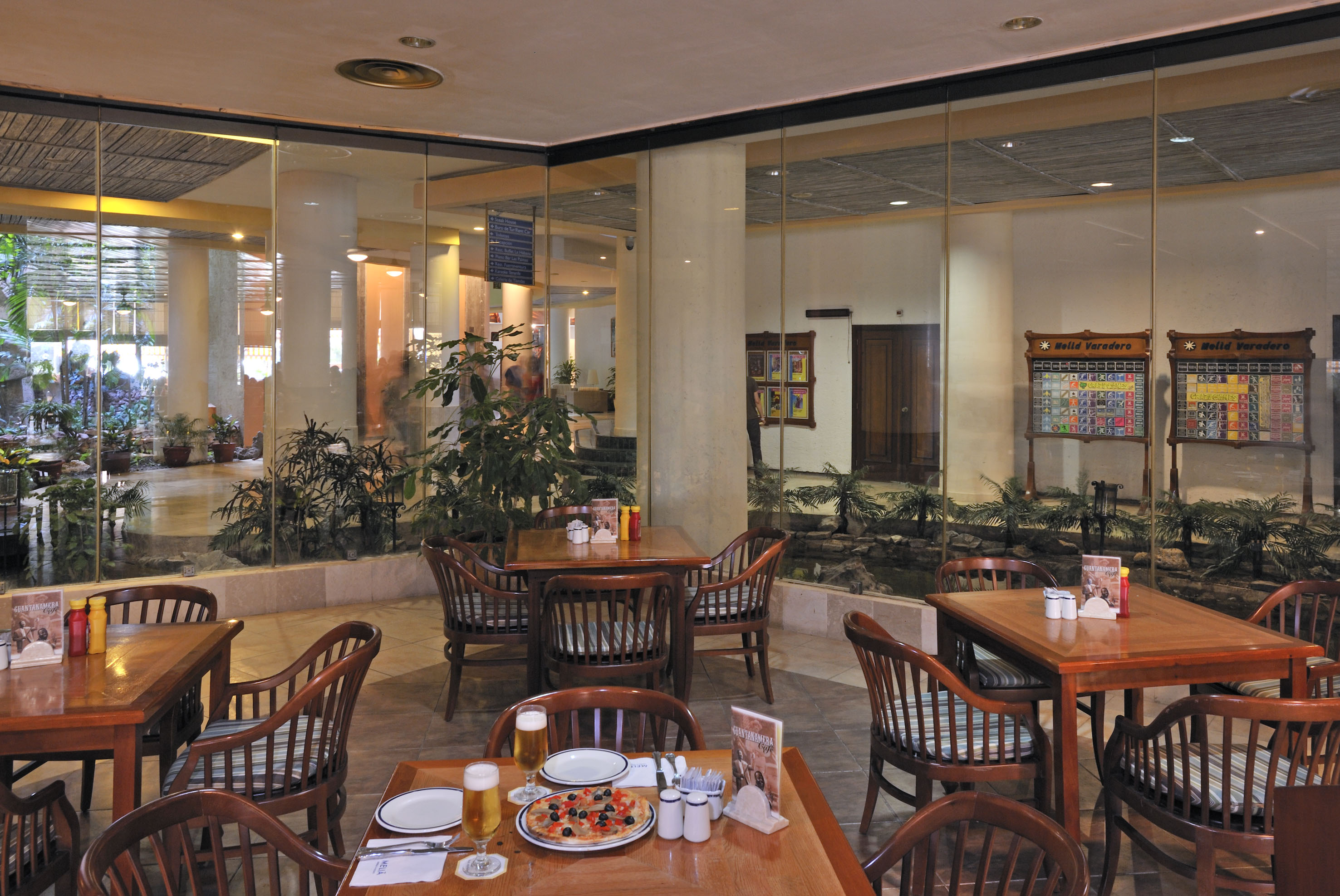 a restaurant with tables and chairs