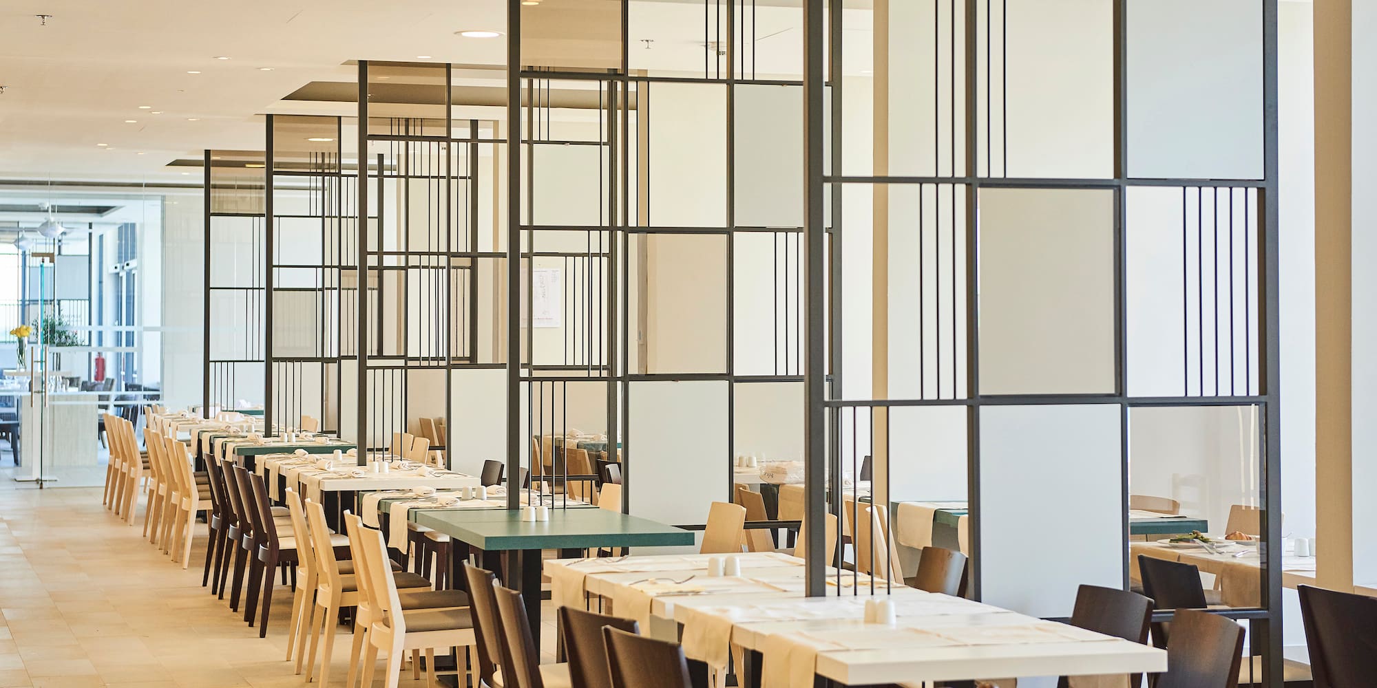 a room with tables and chairs