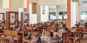 a room with tables and chairs