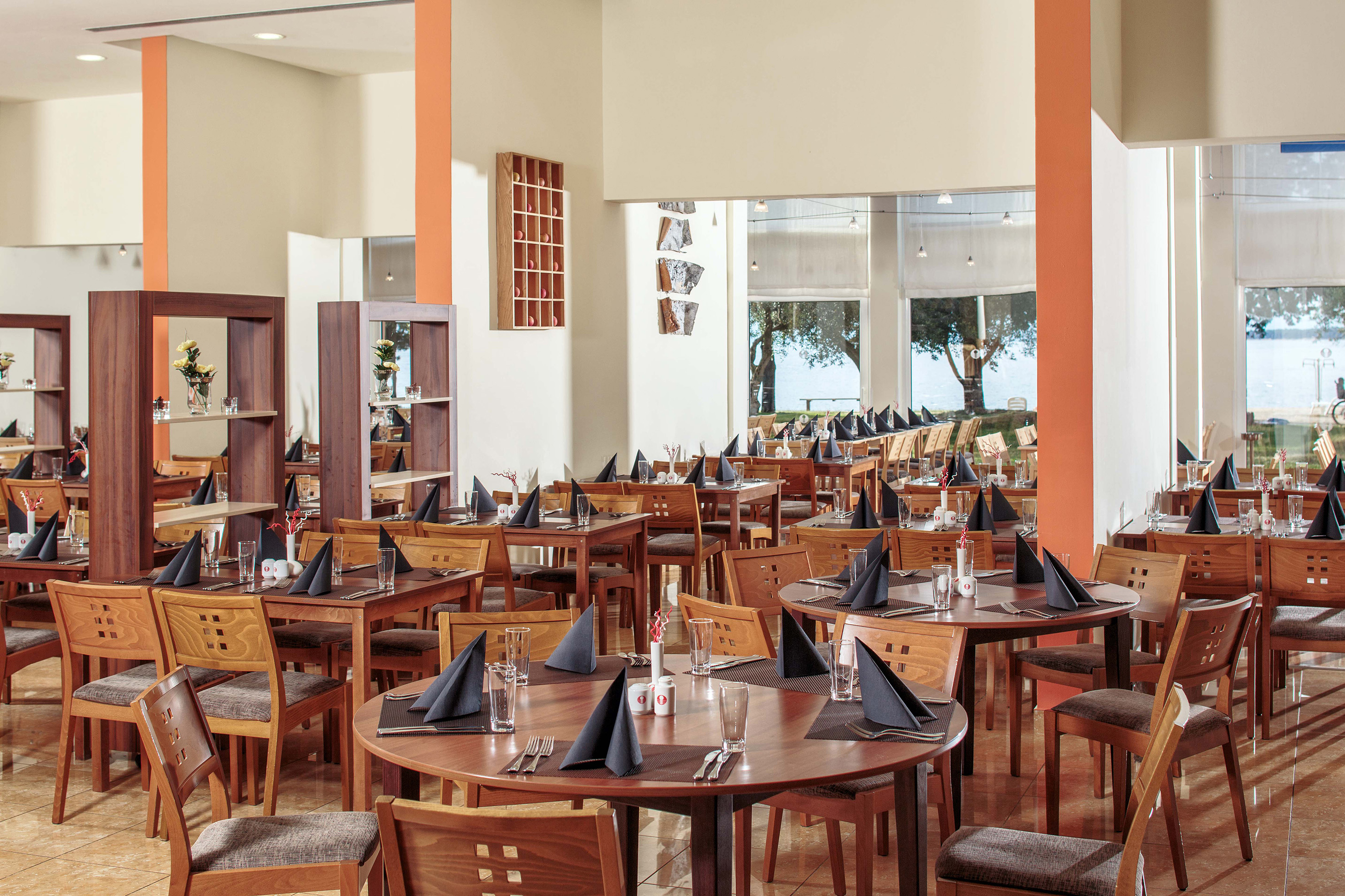 a room with tables and chairs