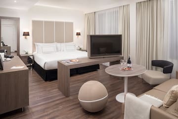 a room with a television and a table