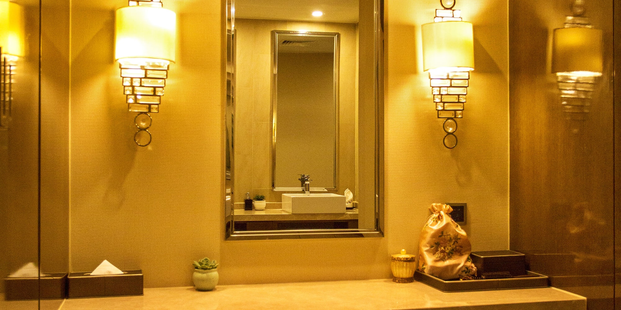 a mirror and a sink in a bathroom