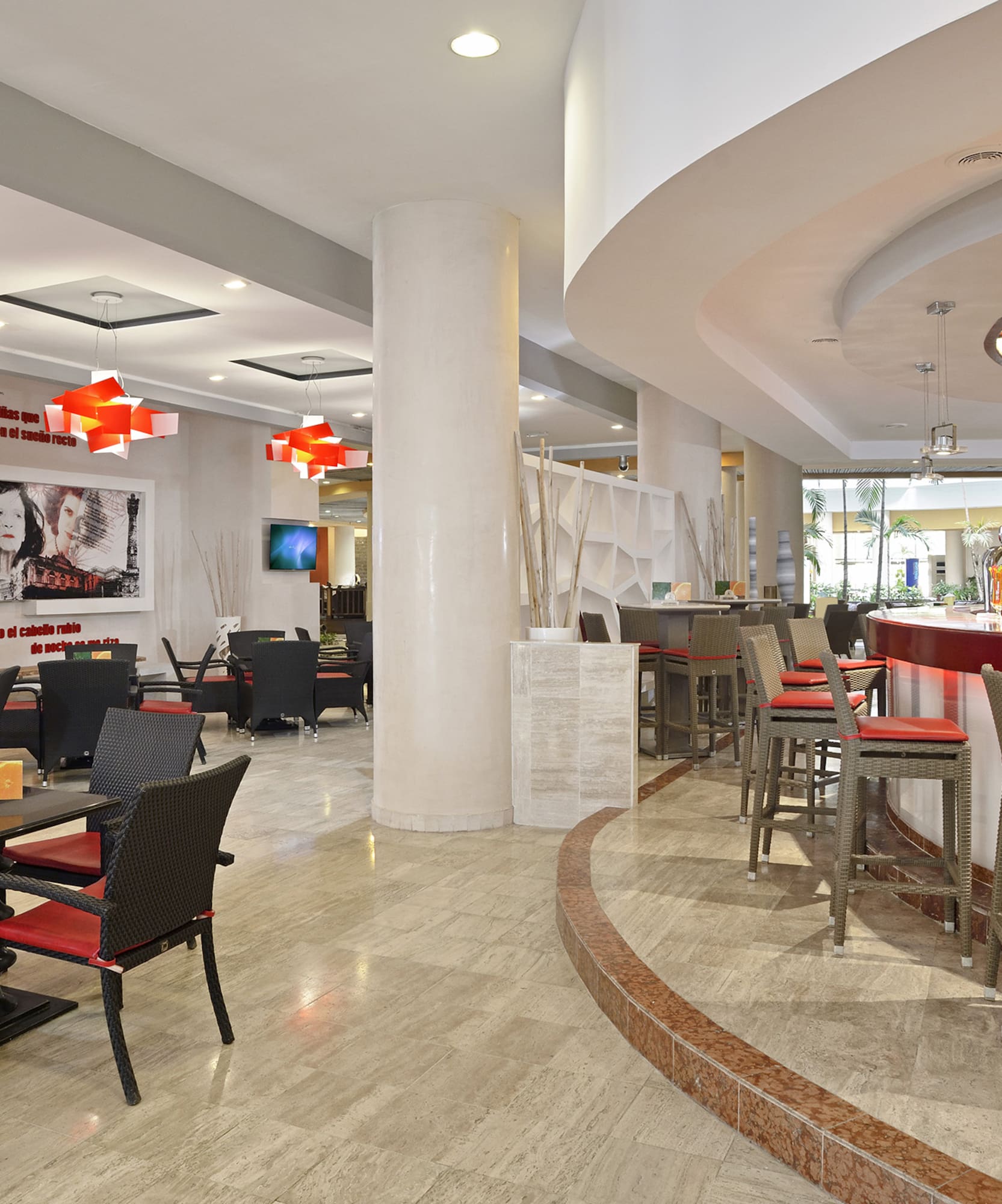 a restaurant with tables and chairs