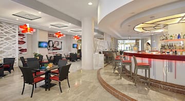 a restaurant with tables and chairs