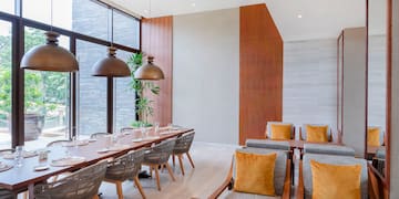 a room with a table and chairs