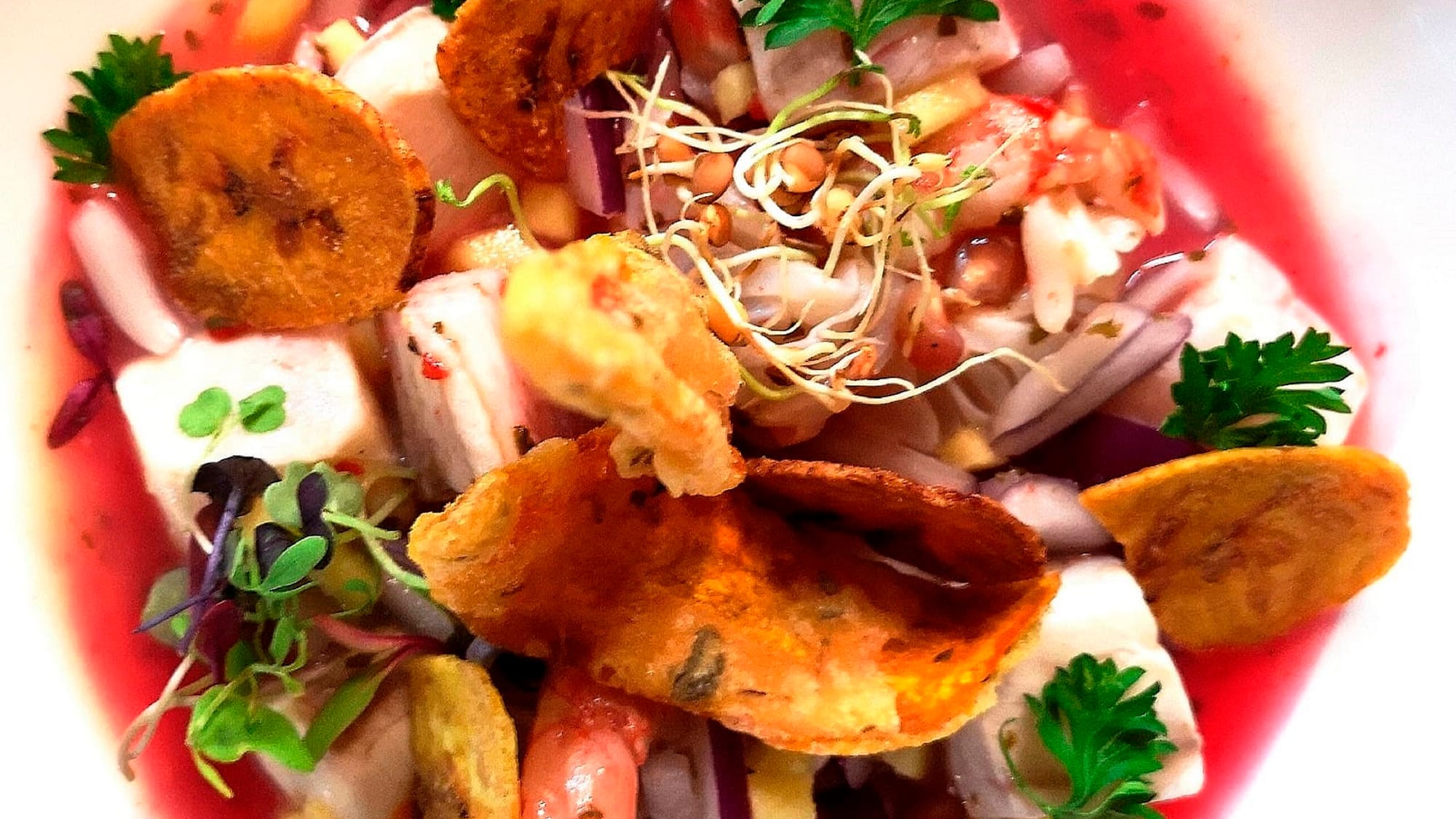 a bowl of food with a sauce