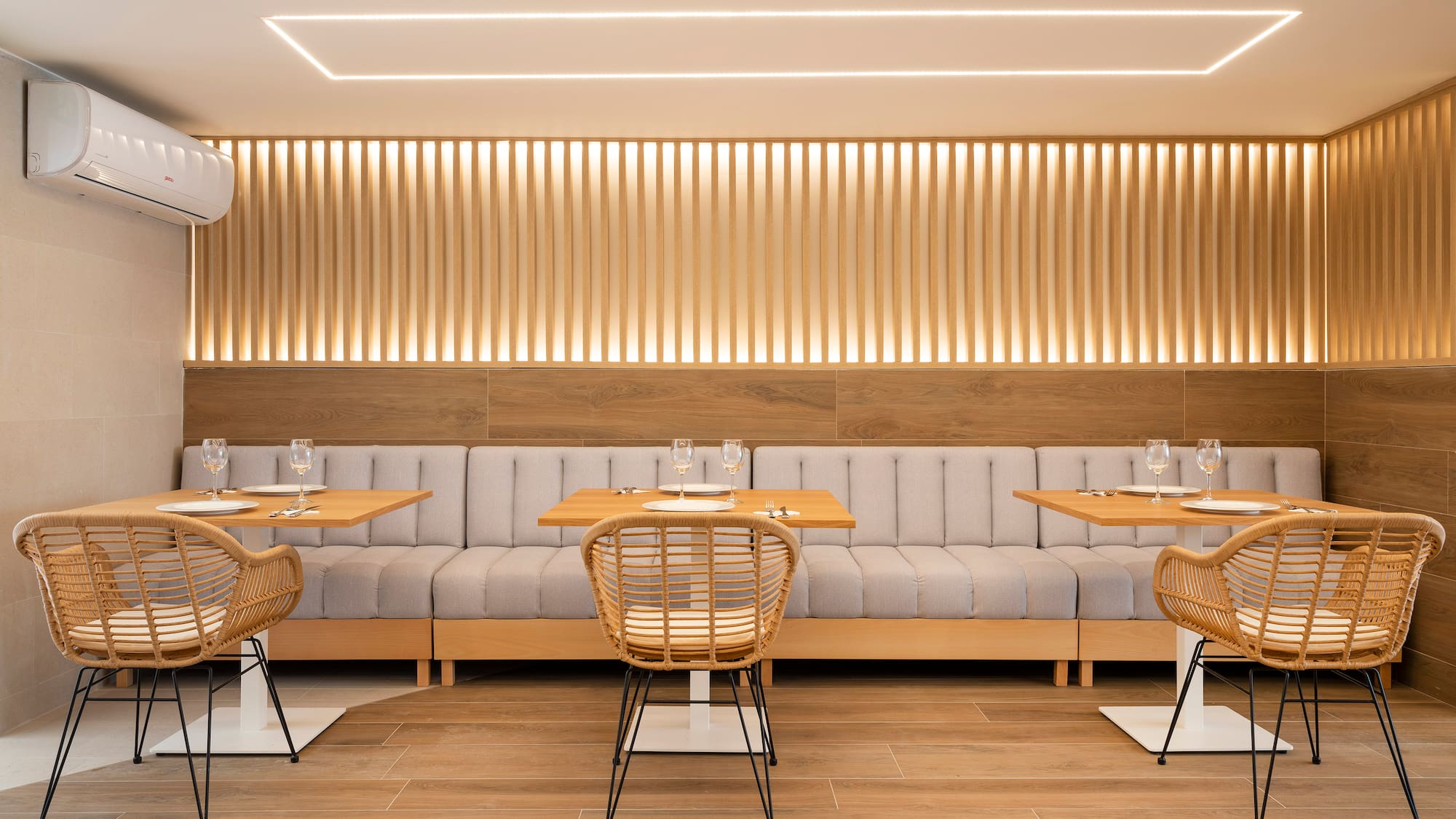 a restaurant with tables and chairs