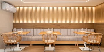 a restaurant with tables and chairs