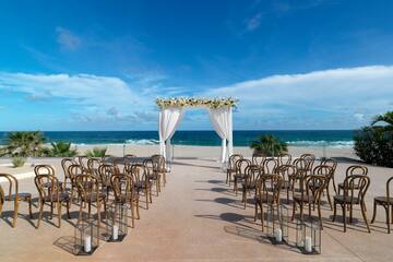 a wedding ceremony set up on a beach