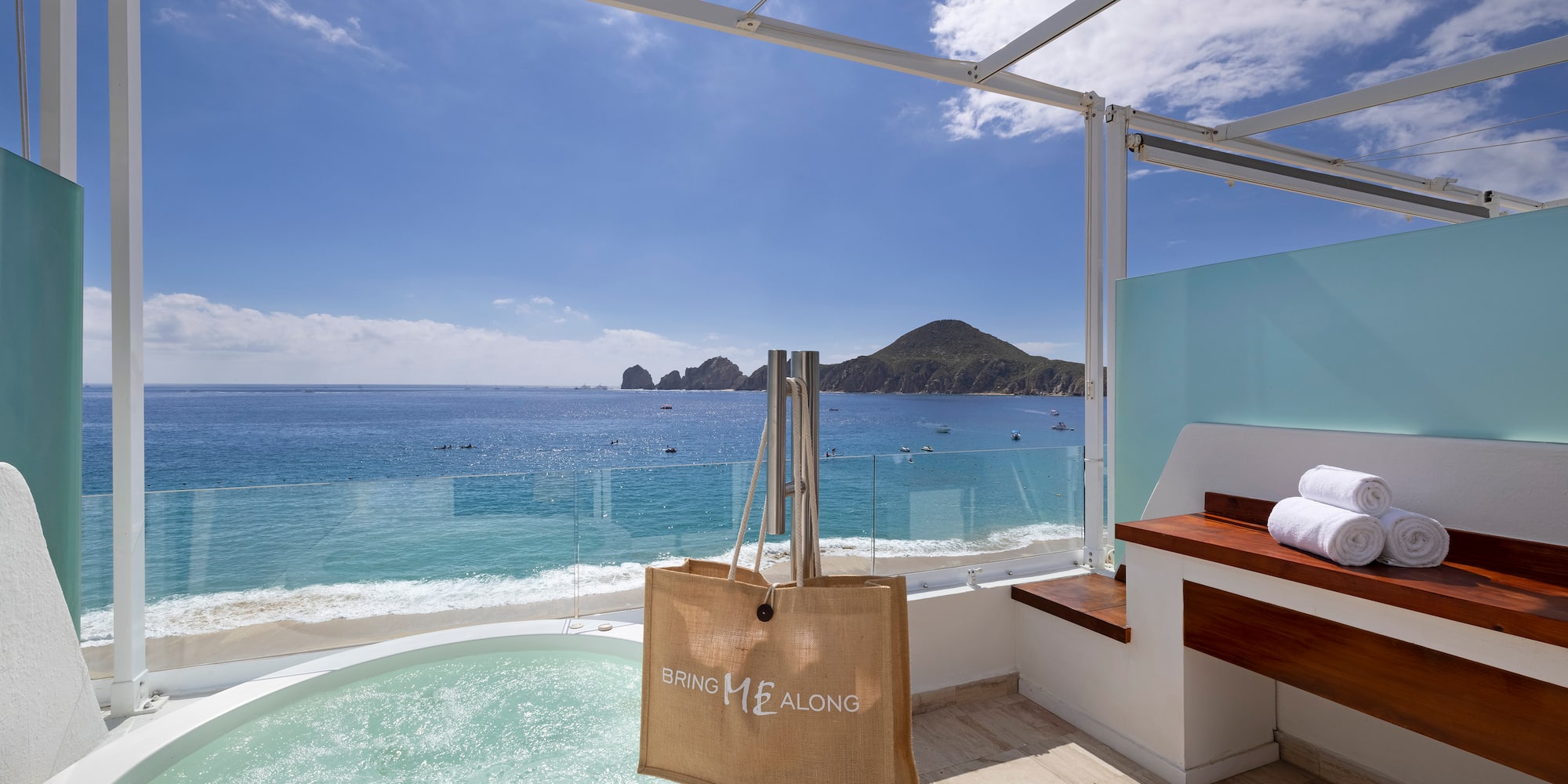 a hot tub overlooking the ocean