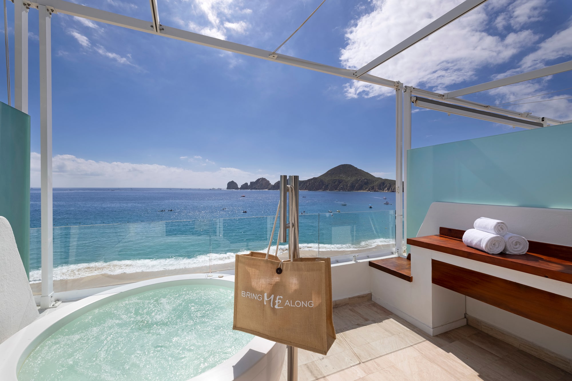 a hot tub overlooking the ocean