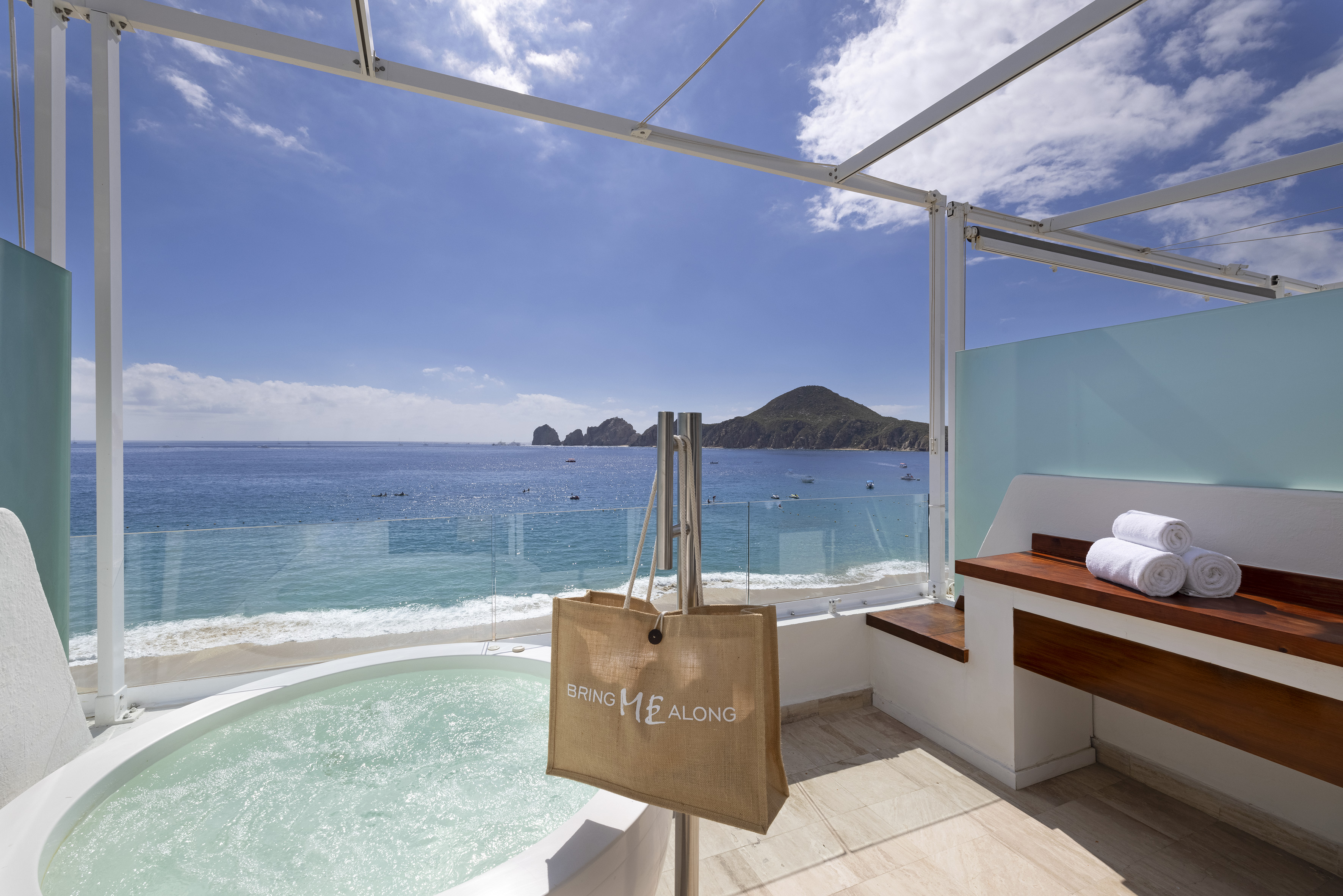 a hot tub overlooking the ocean
