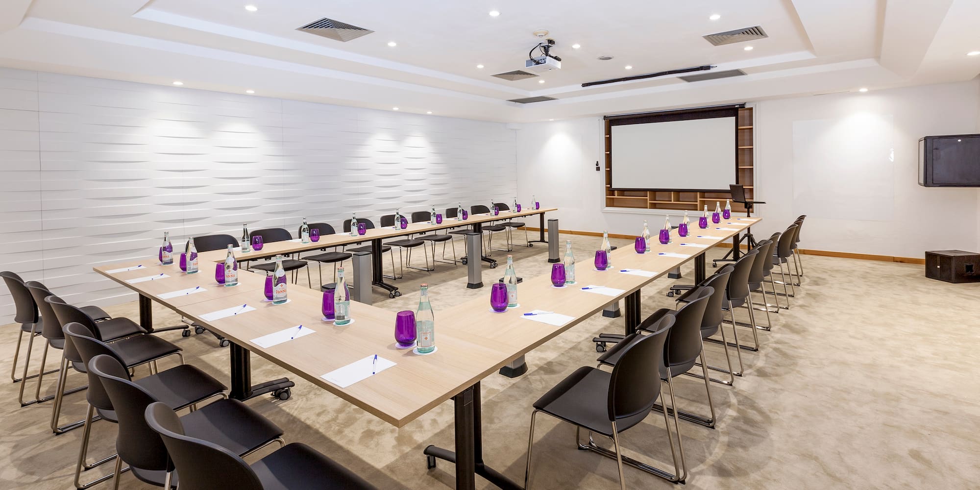 a room with tables and chairs