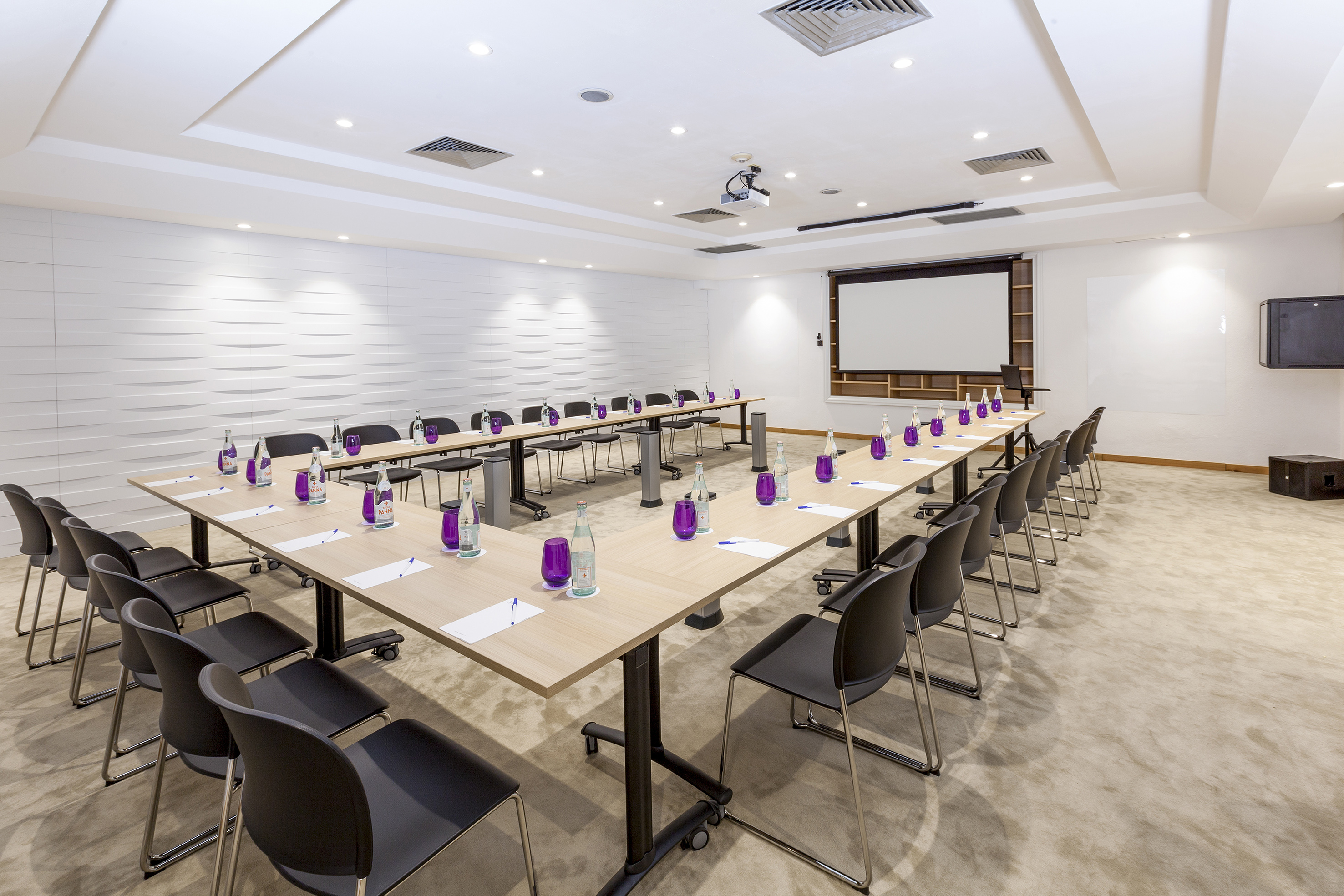 a room with tables and chairs