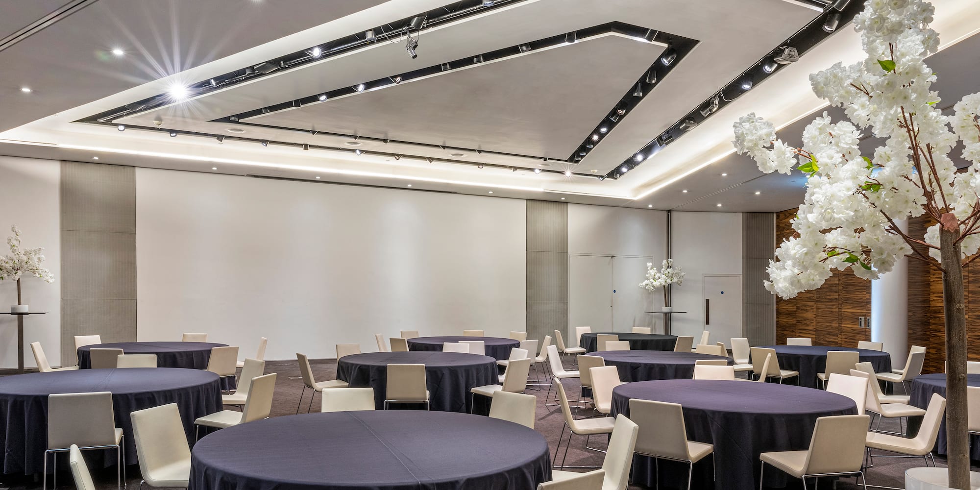 a room with tables and chairs