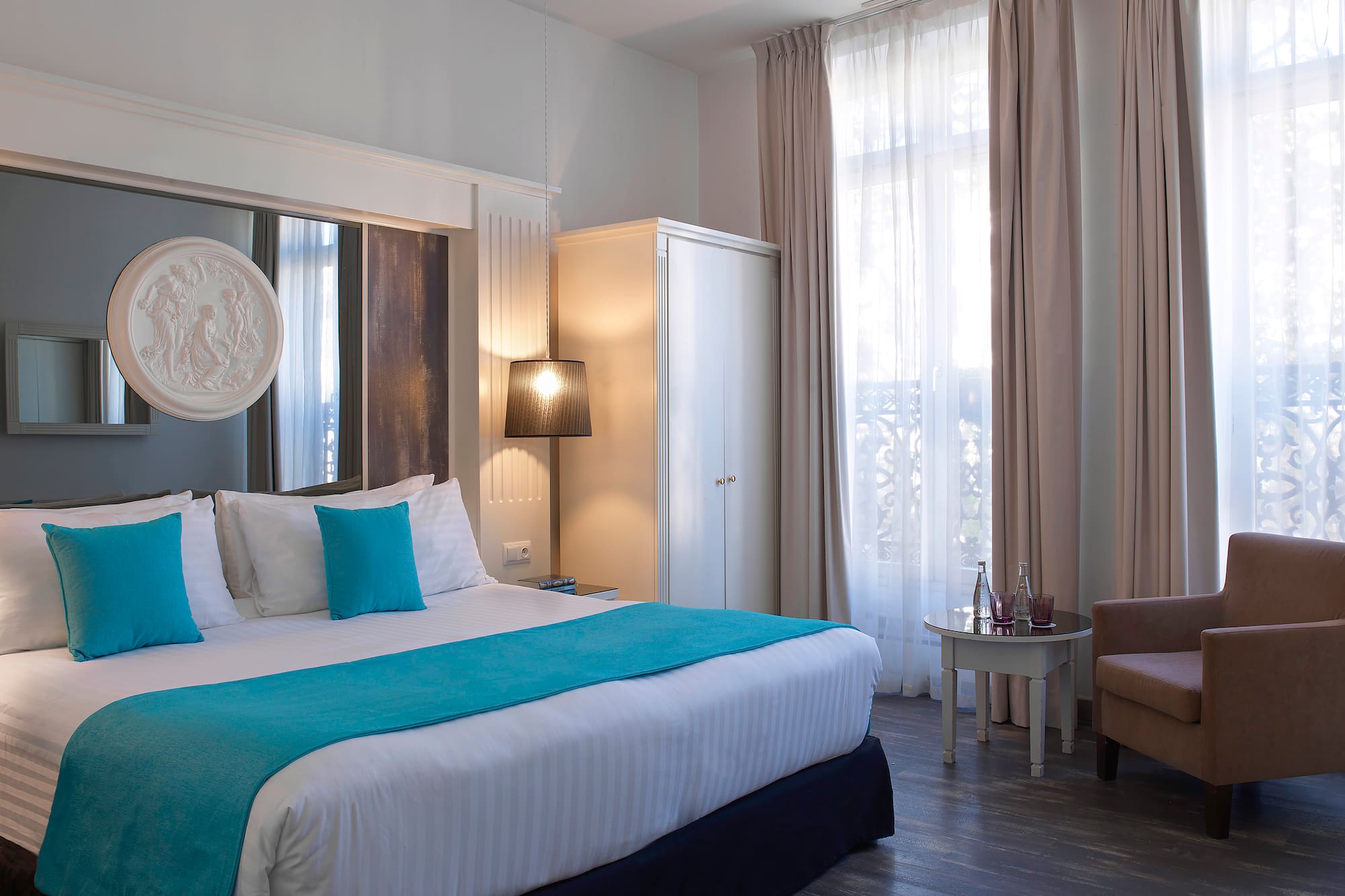 a room with a bed and a chair