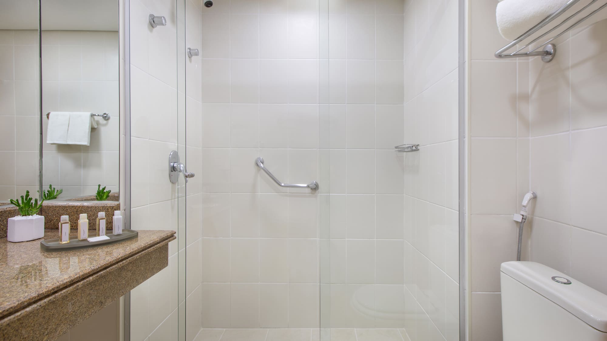 a bathroom with a glass shower