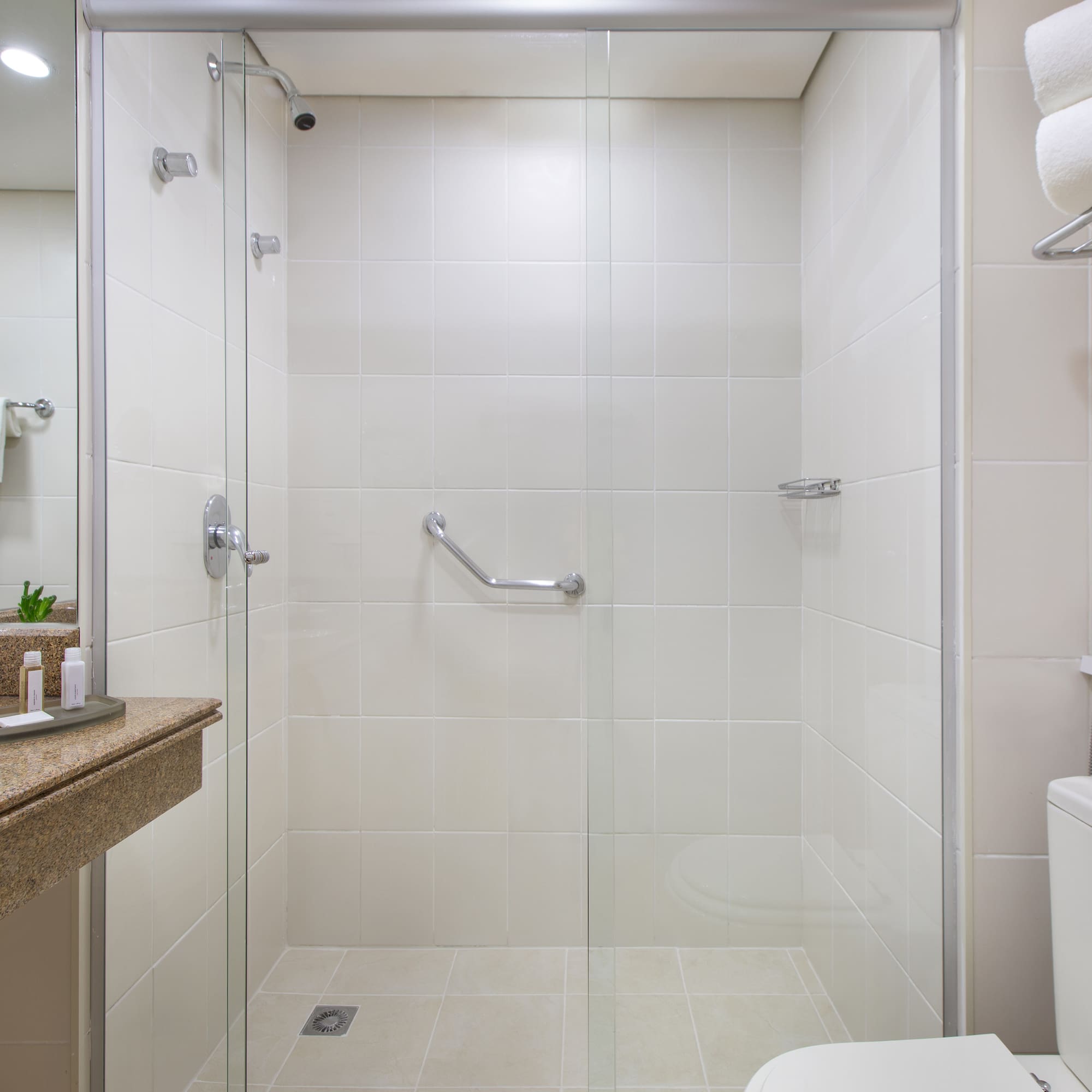 a bathroom with a glass shower