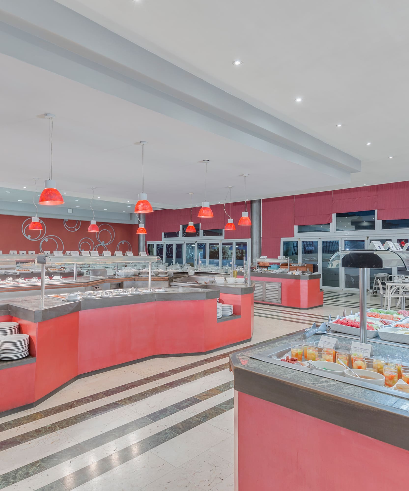 a food court with red and white counter tops