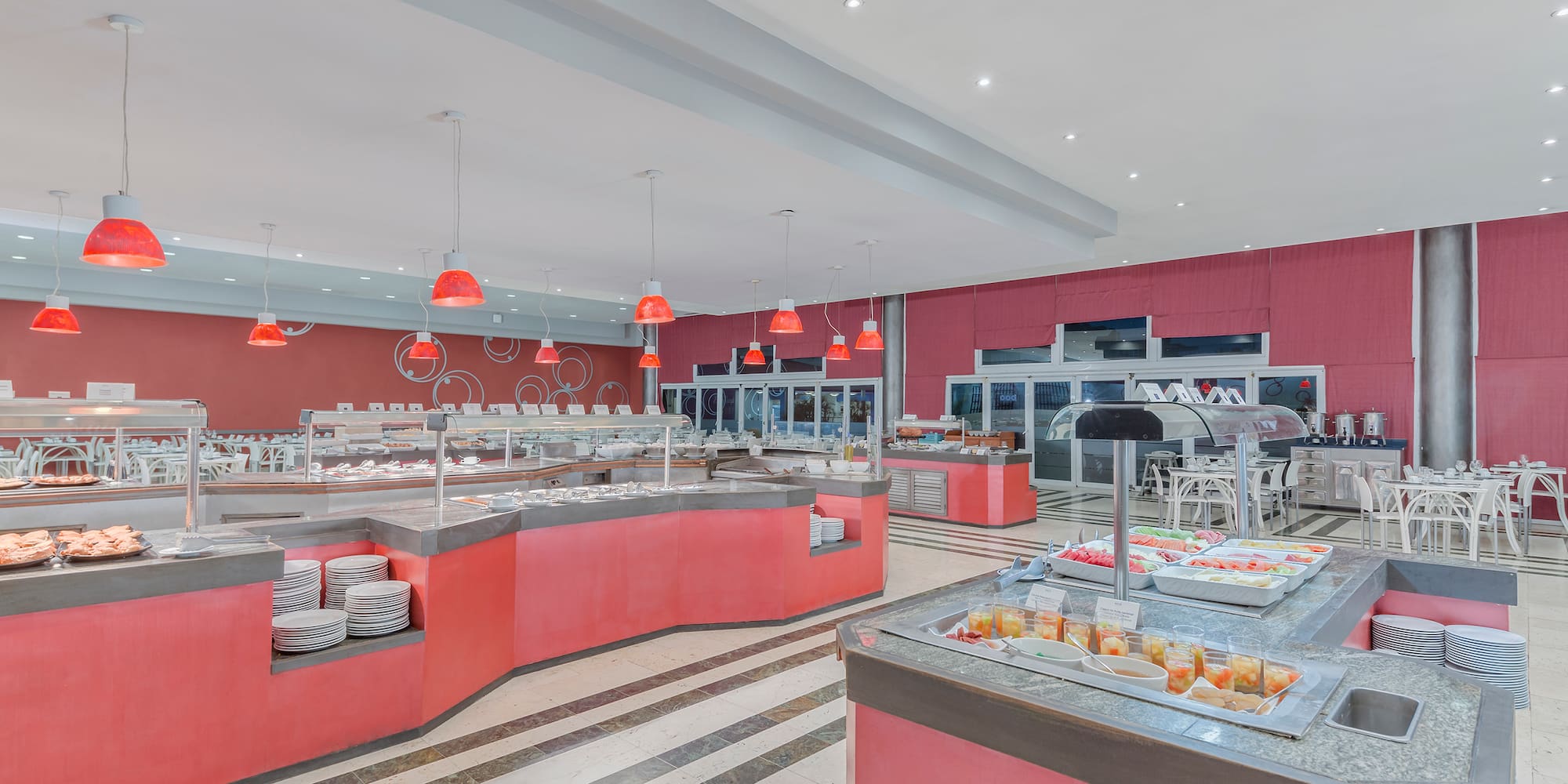 a food court with red and white counter tops