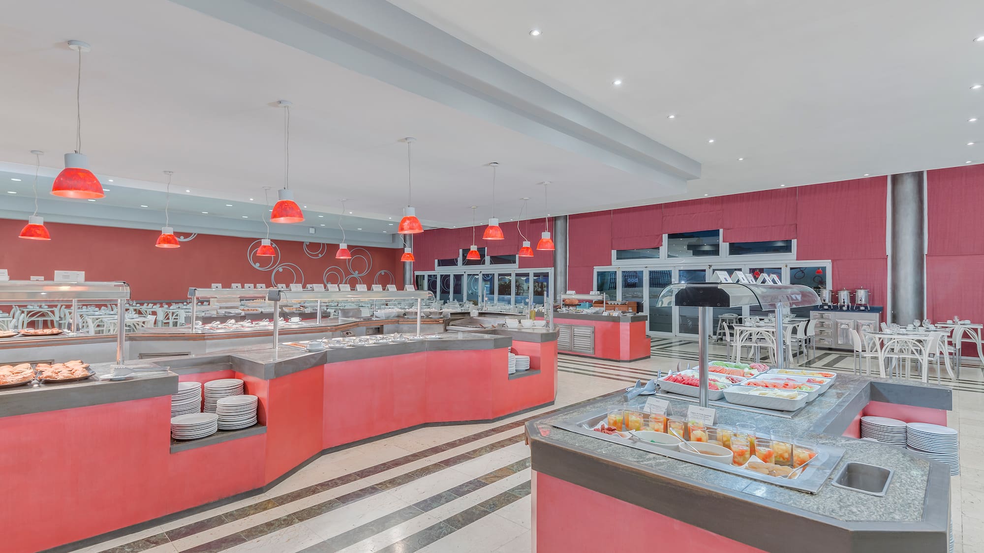 a food court with red and white counter tops