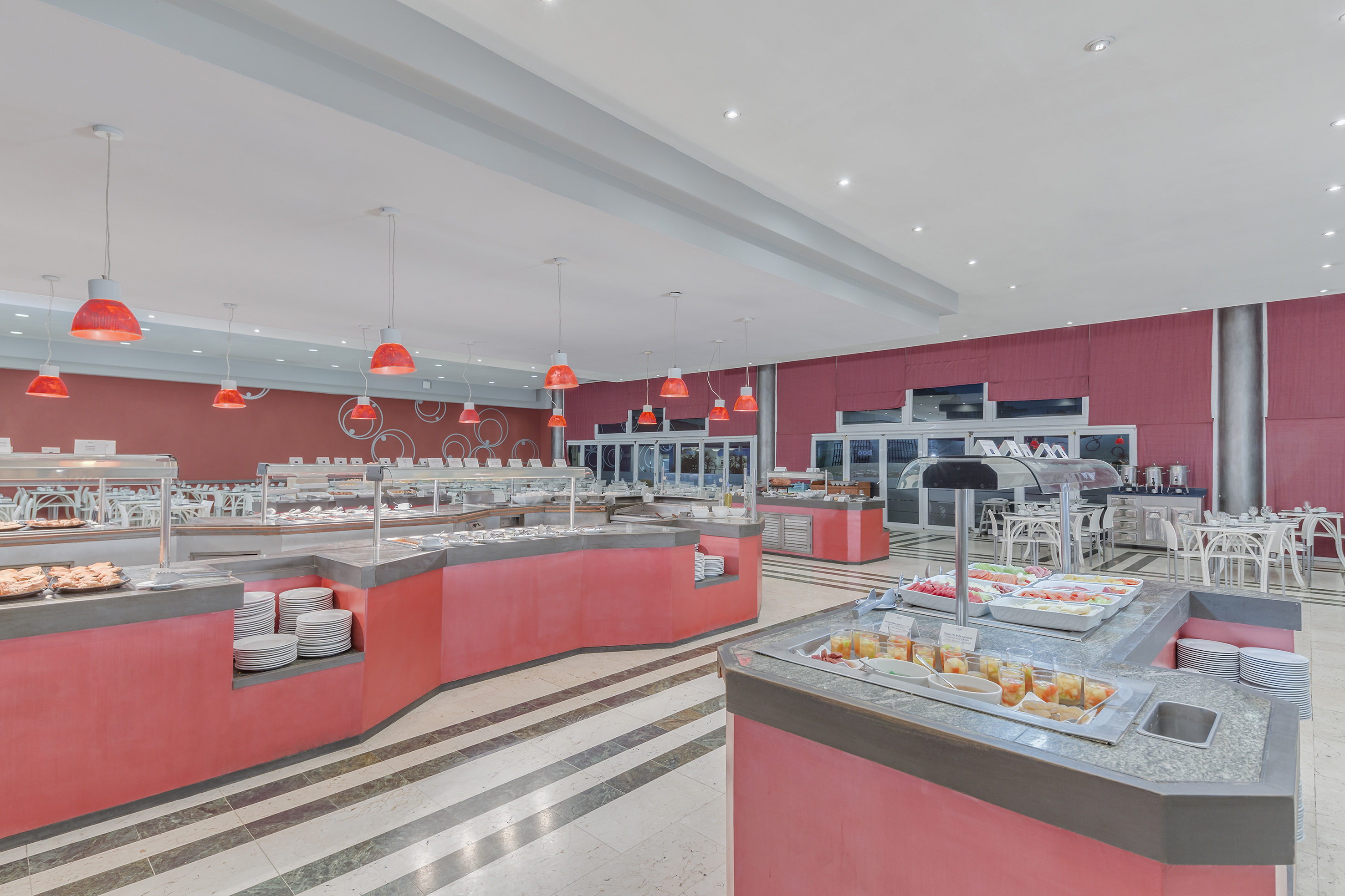 a food court with red and white counter tops
