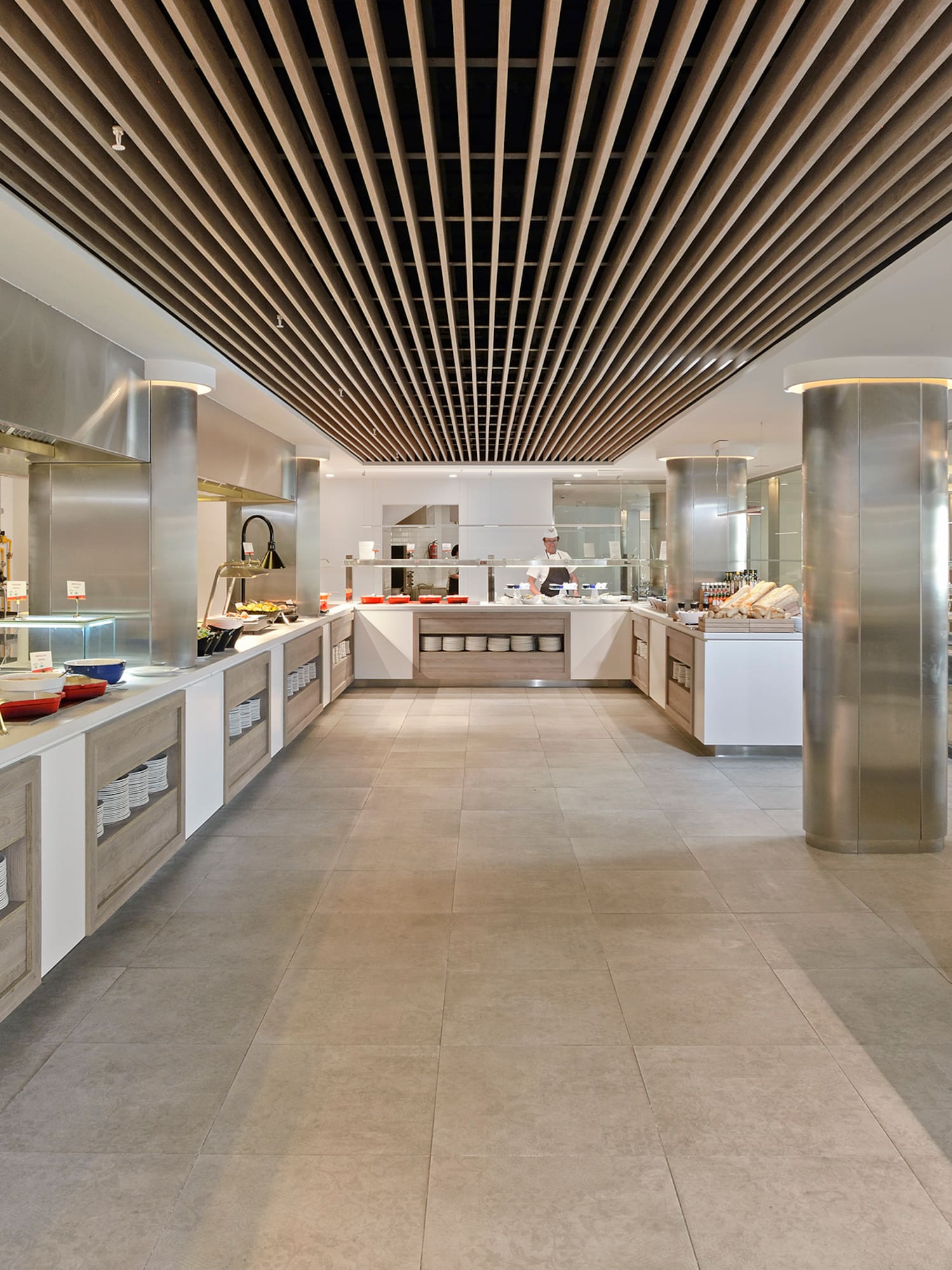 a large kitchen with food on the counter