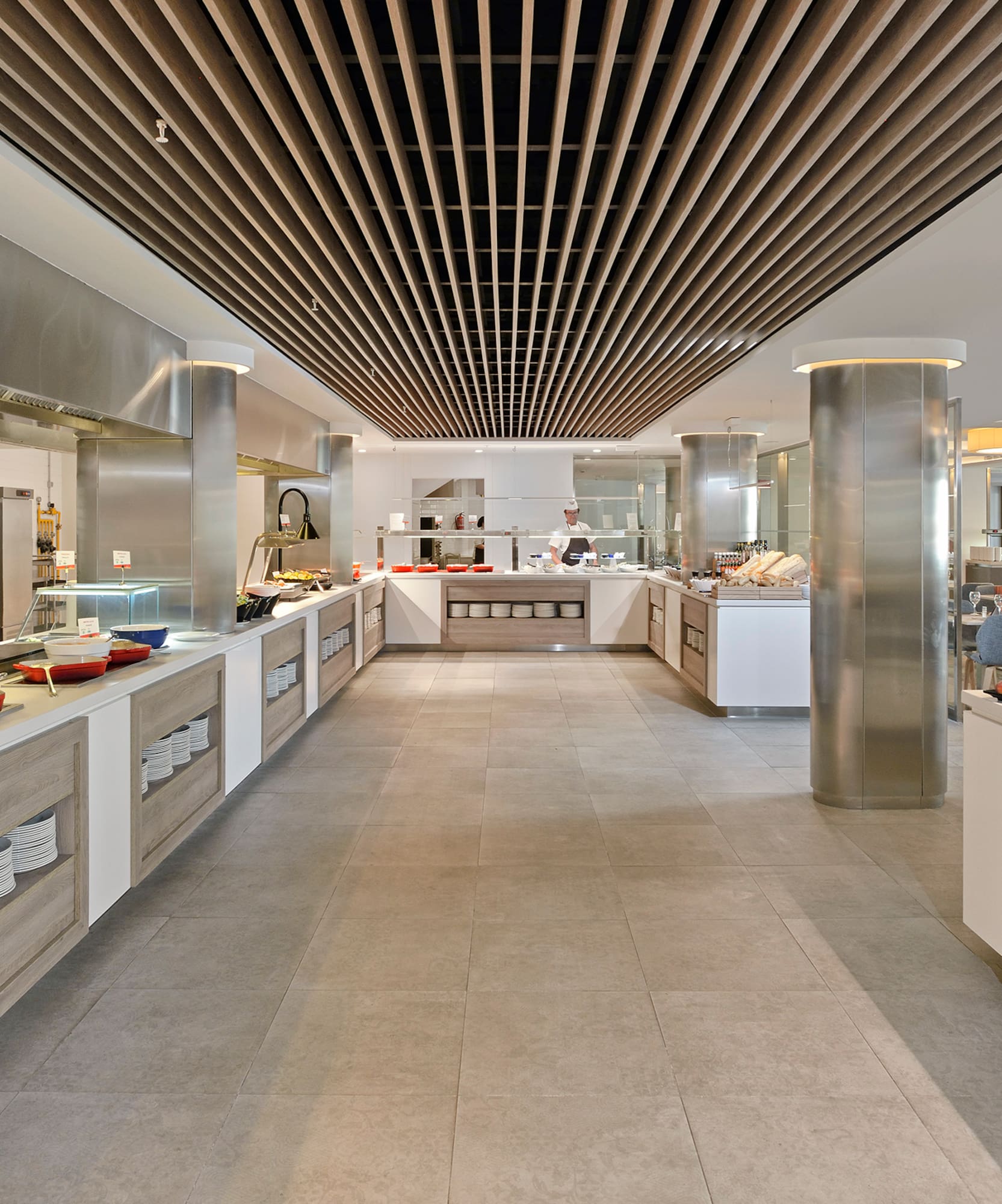 a large kitchen with food on the counter