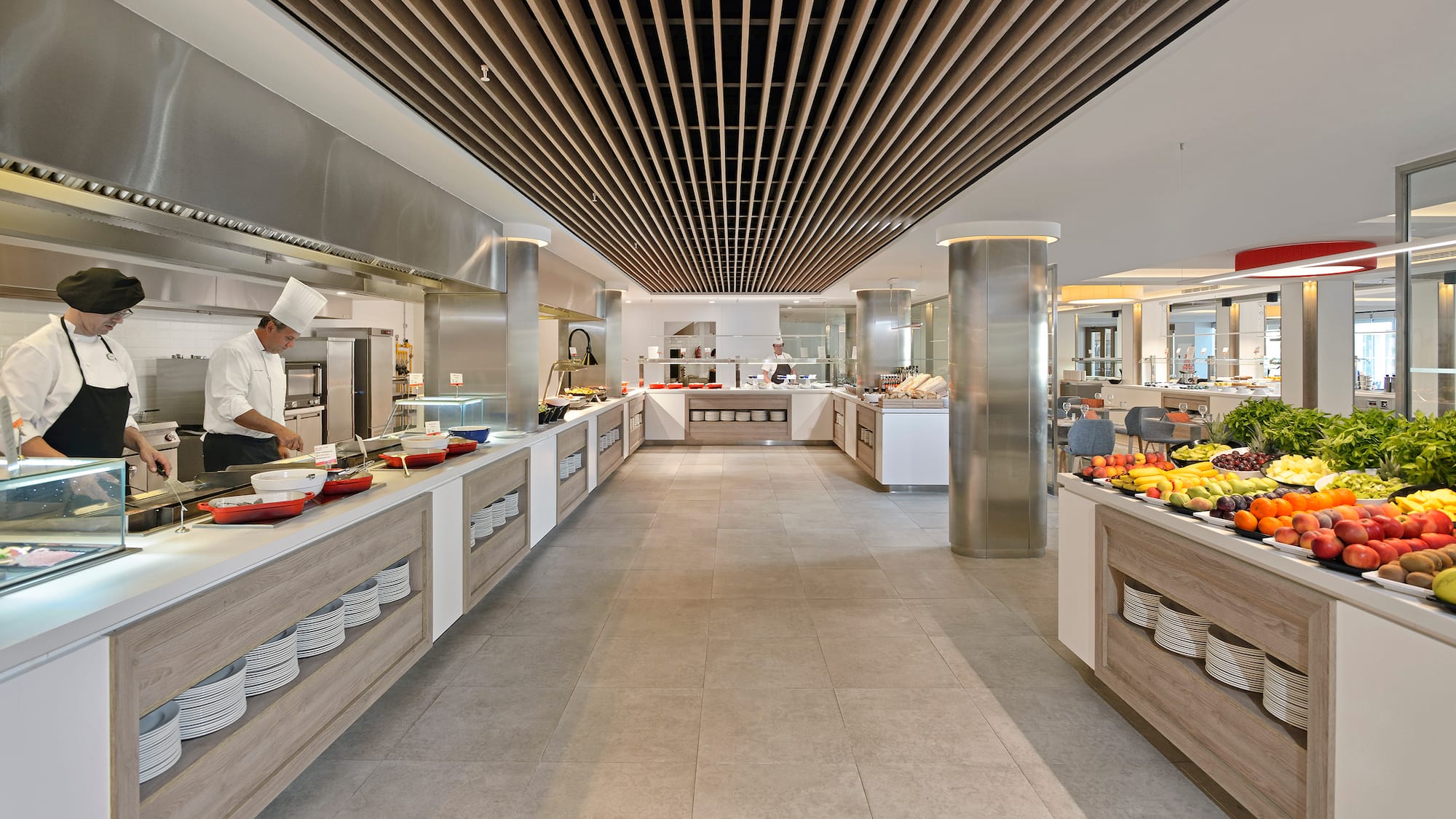 a large kitchen with food on the counter