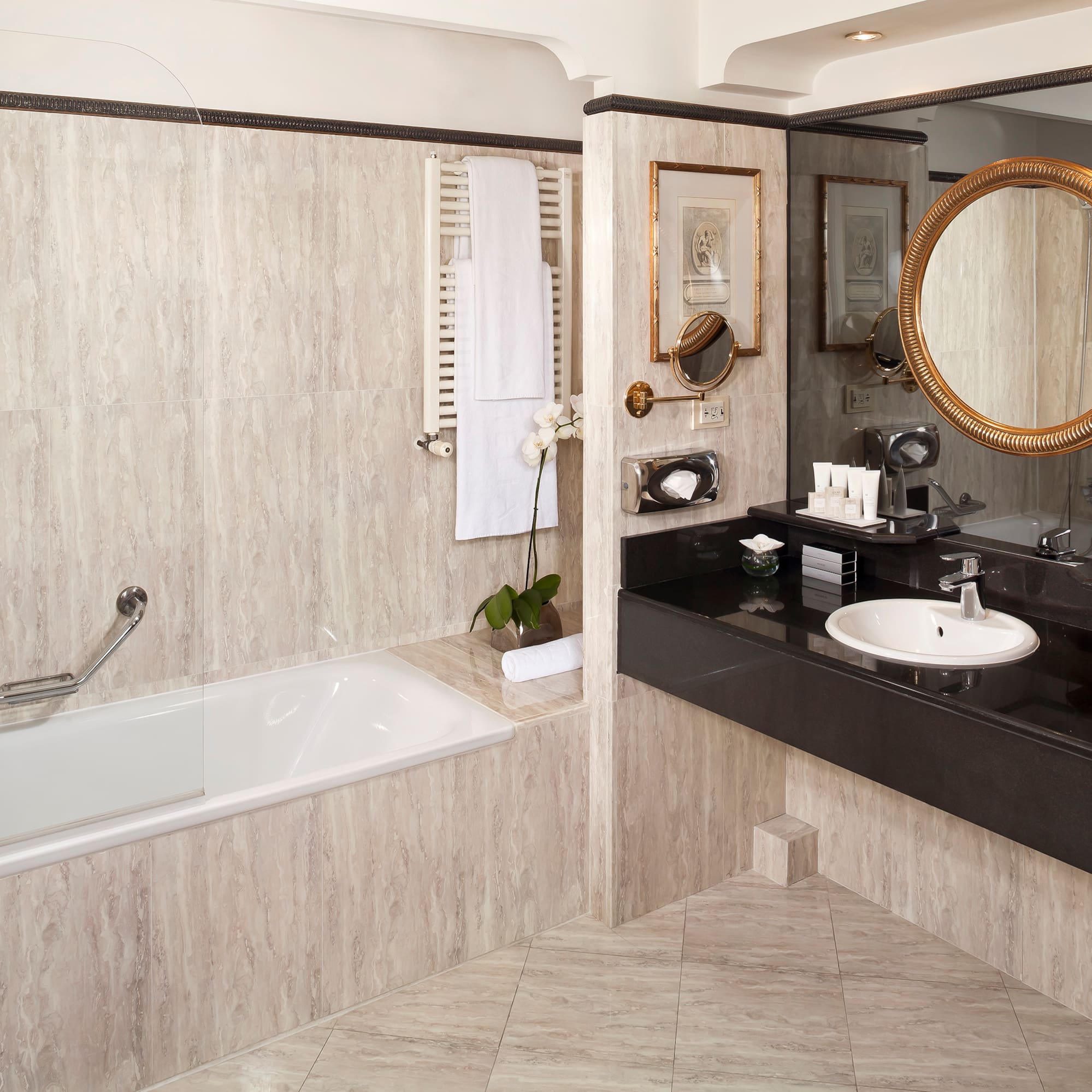 a bathroom with a tub and sink