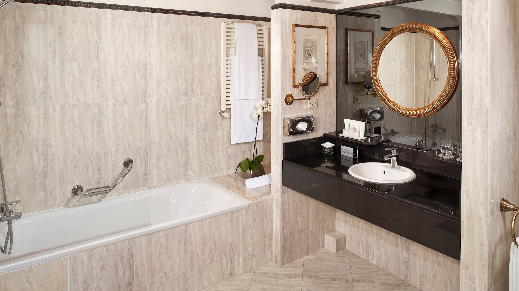 a bathroom with a tub and sink