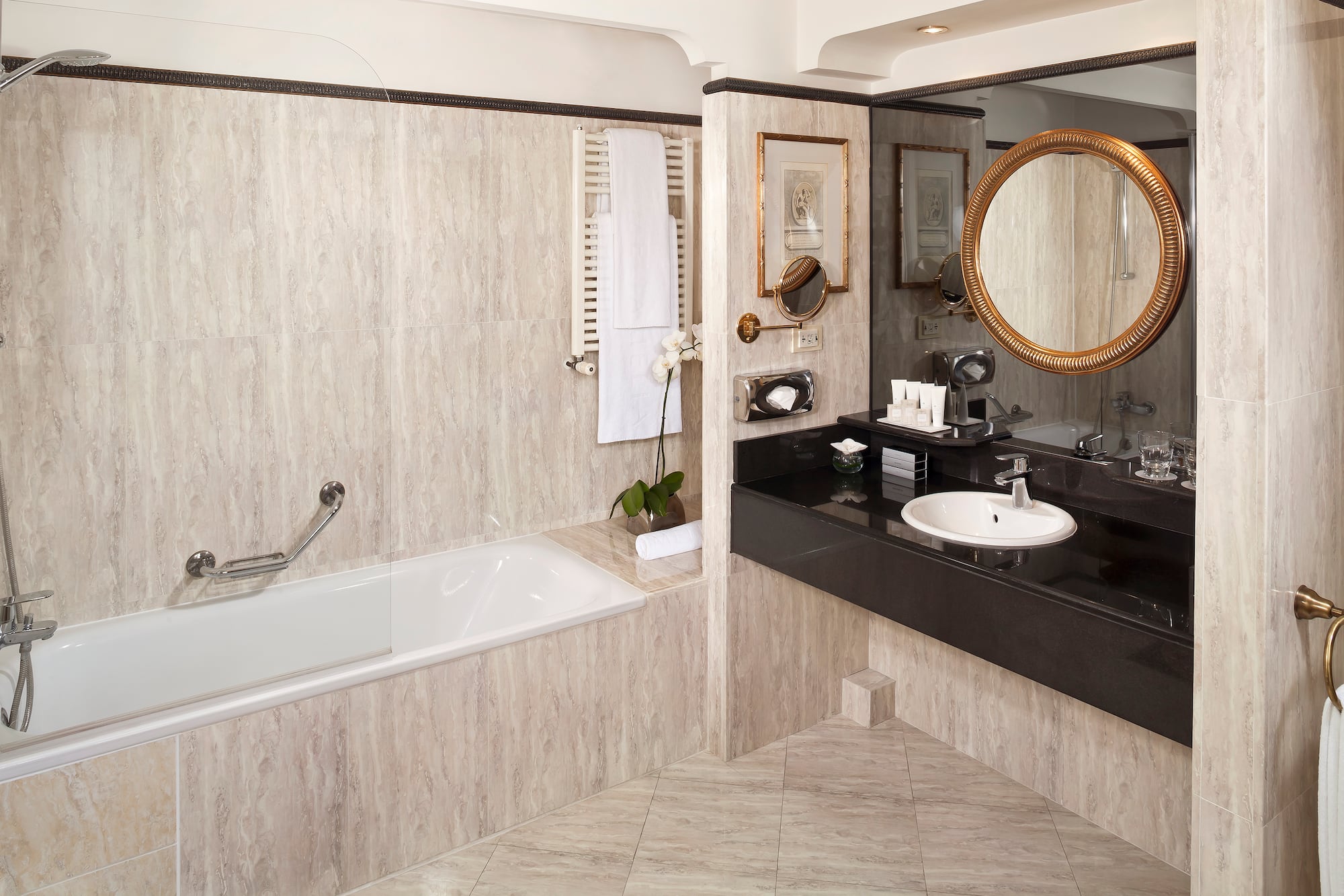 a bathroom with a tub and sink