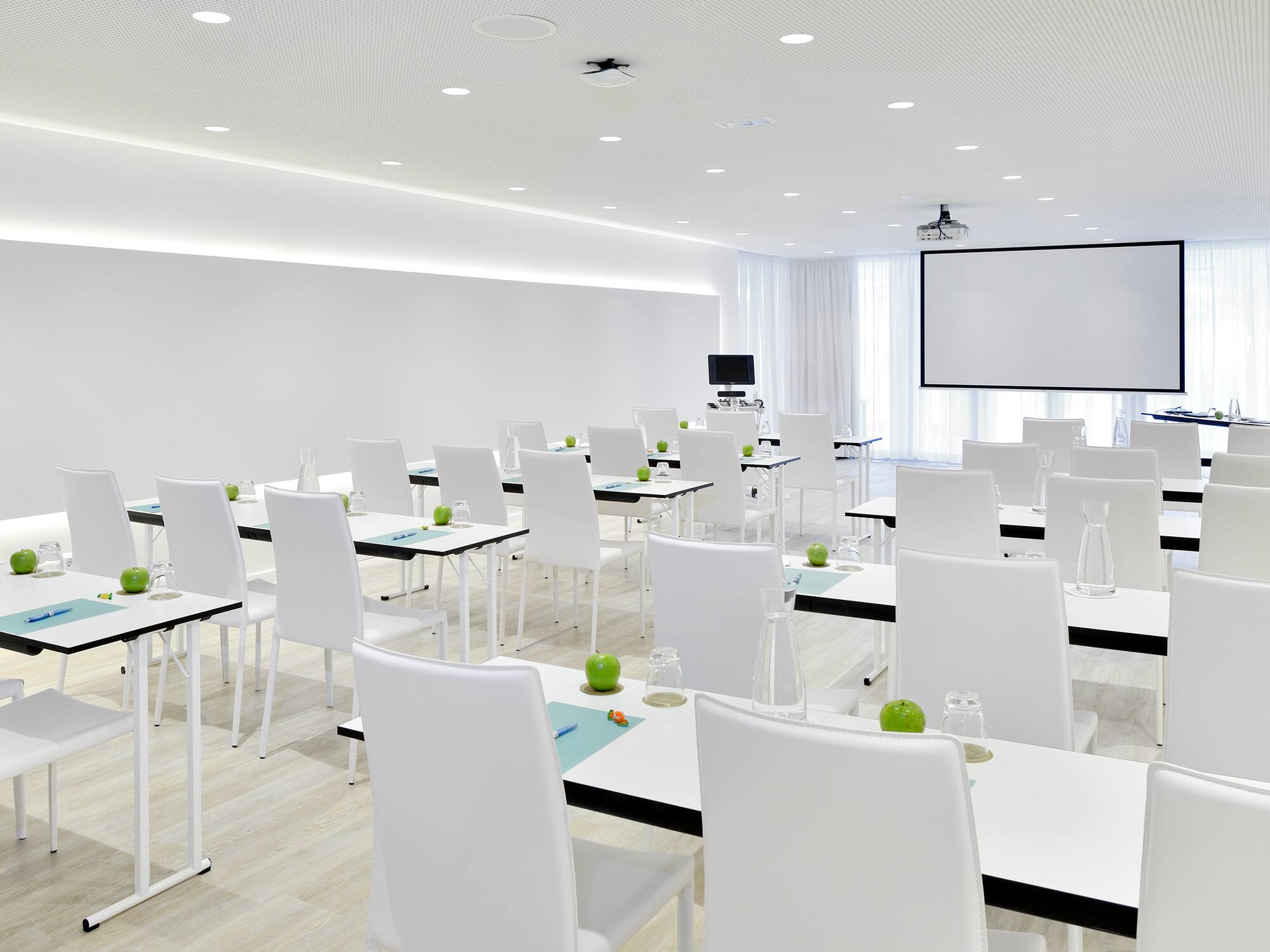 a room with tables and chairs