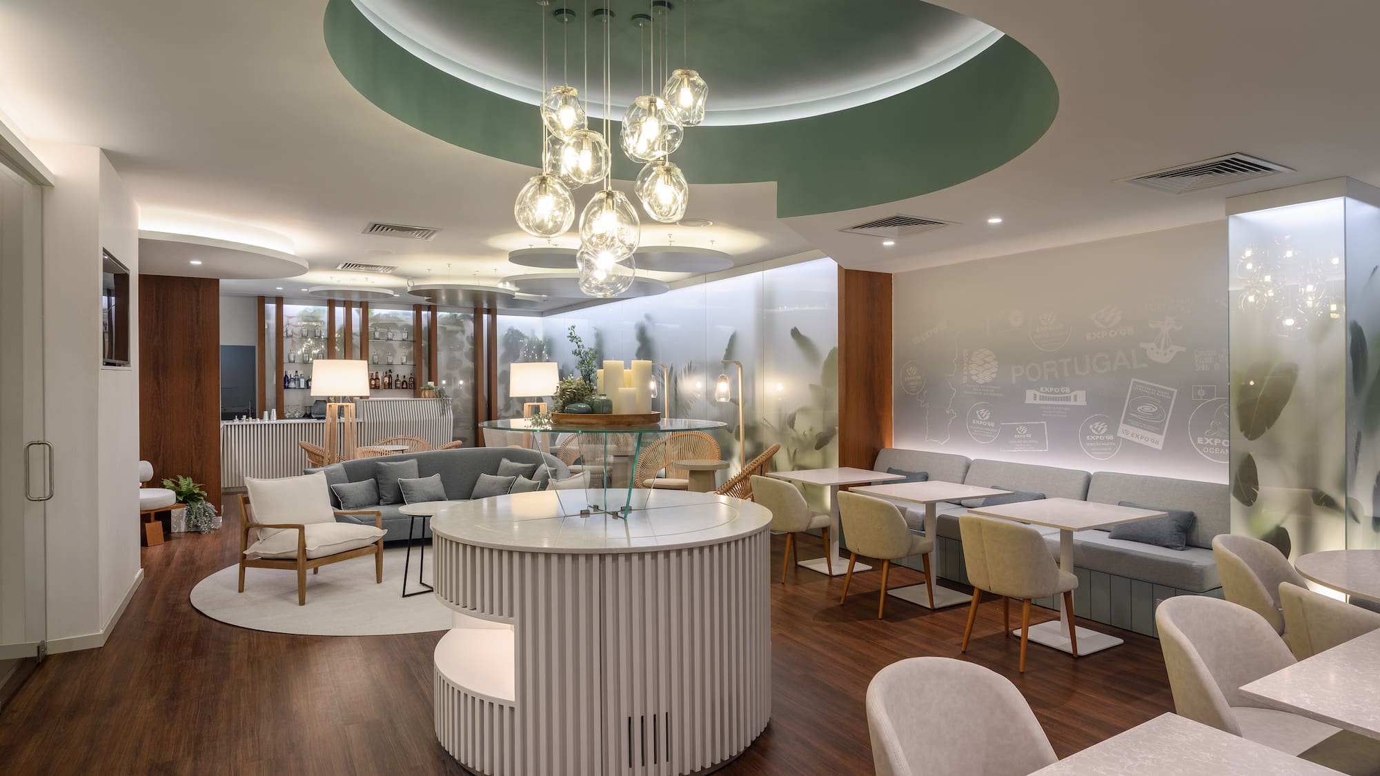 a room with a round table and chairs