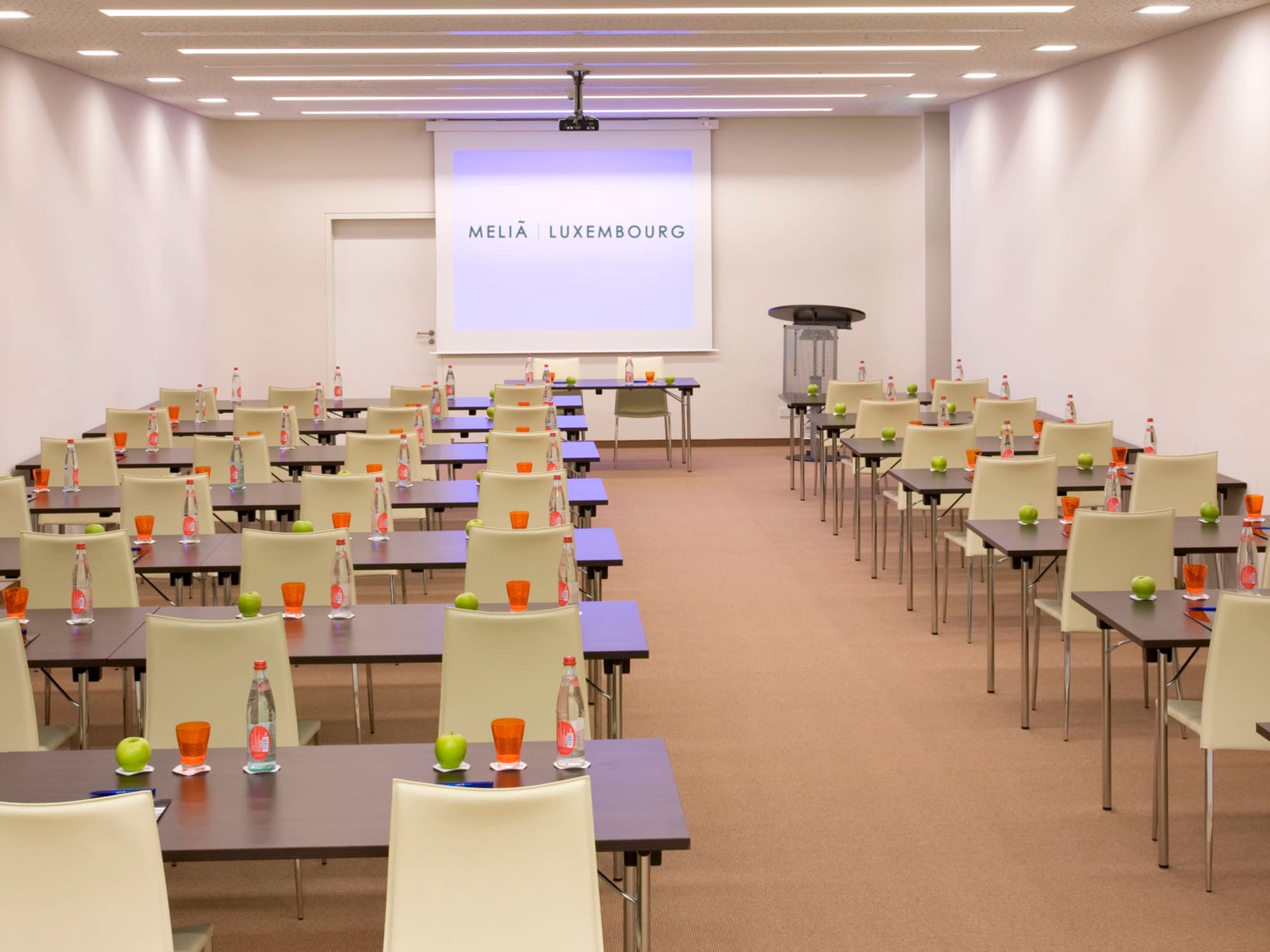 a room with tables and chairs
