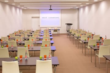 a room with tables and chairs