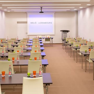 a room with tables and chairs