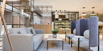 a room with a couch and a coffee table