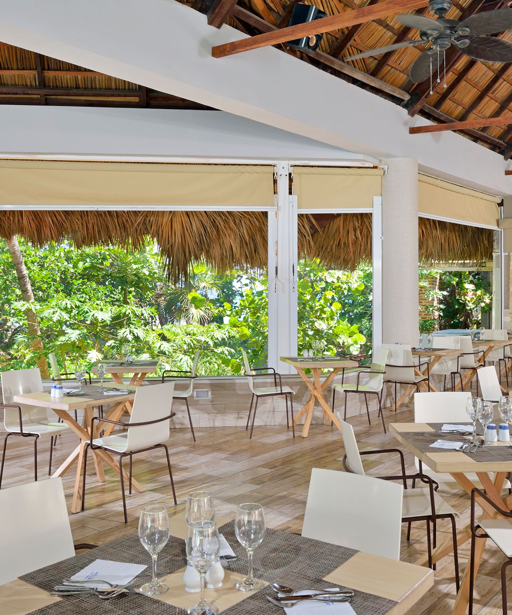 a room with tables and chairs