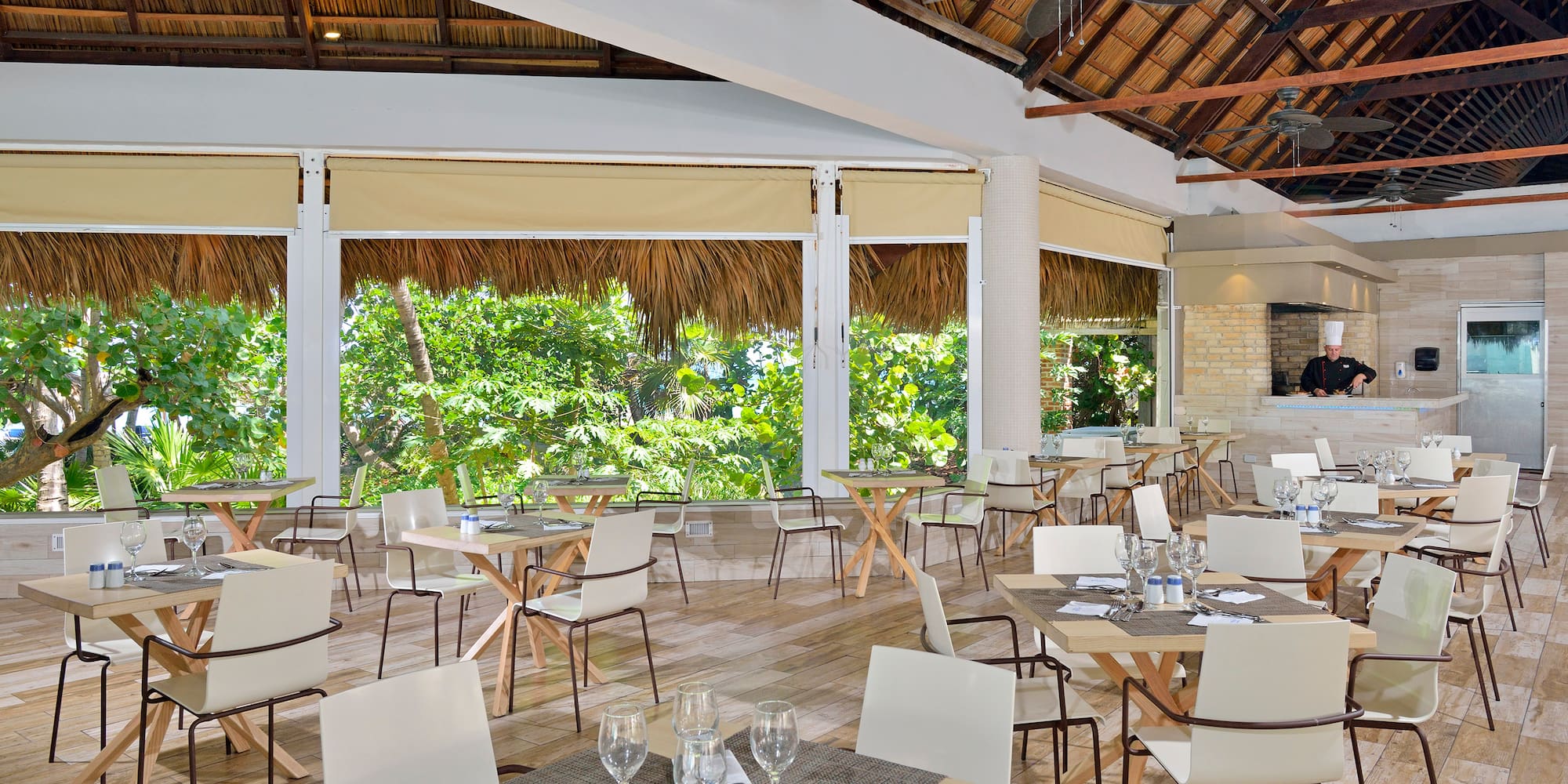 a room with tables and chairs